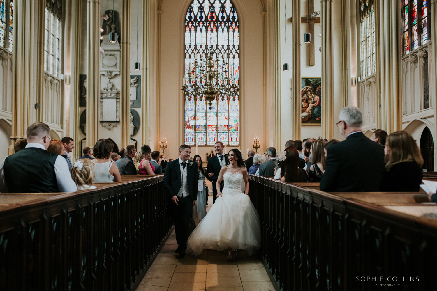 bride and groom leaving church 