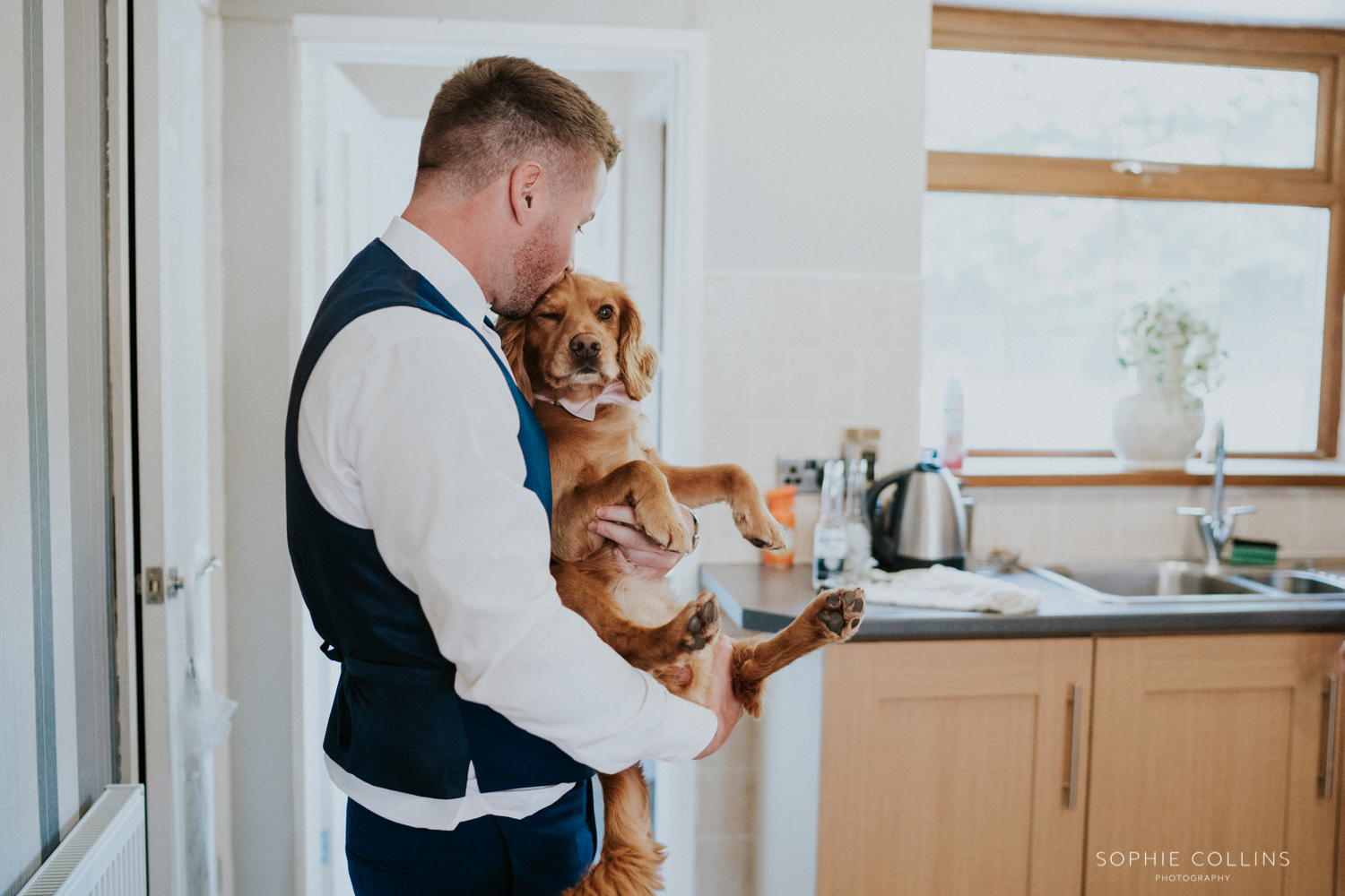 Groom and dog 