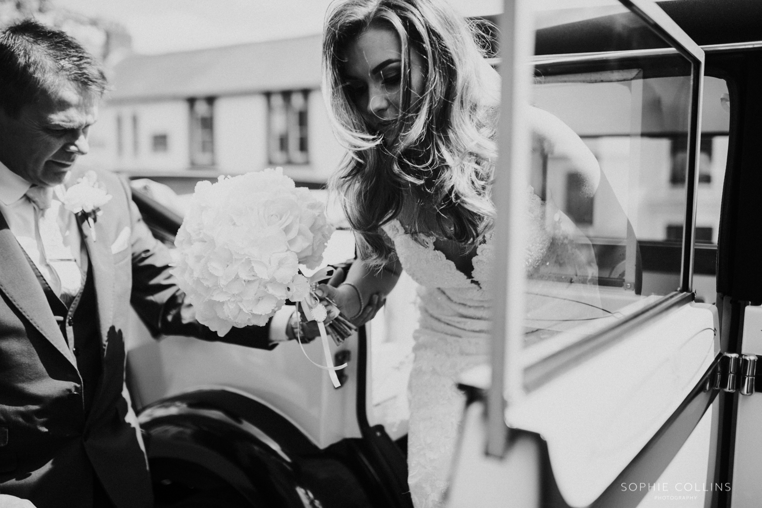 bride getting out of the car 