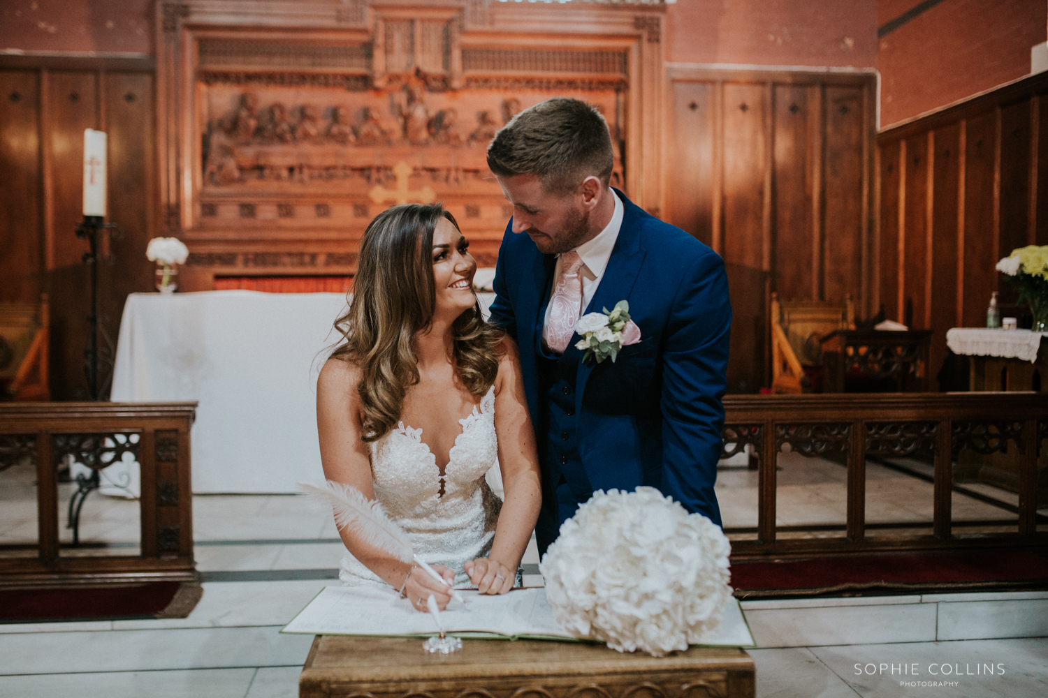 signing the register 