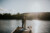 bride and groom by the lake