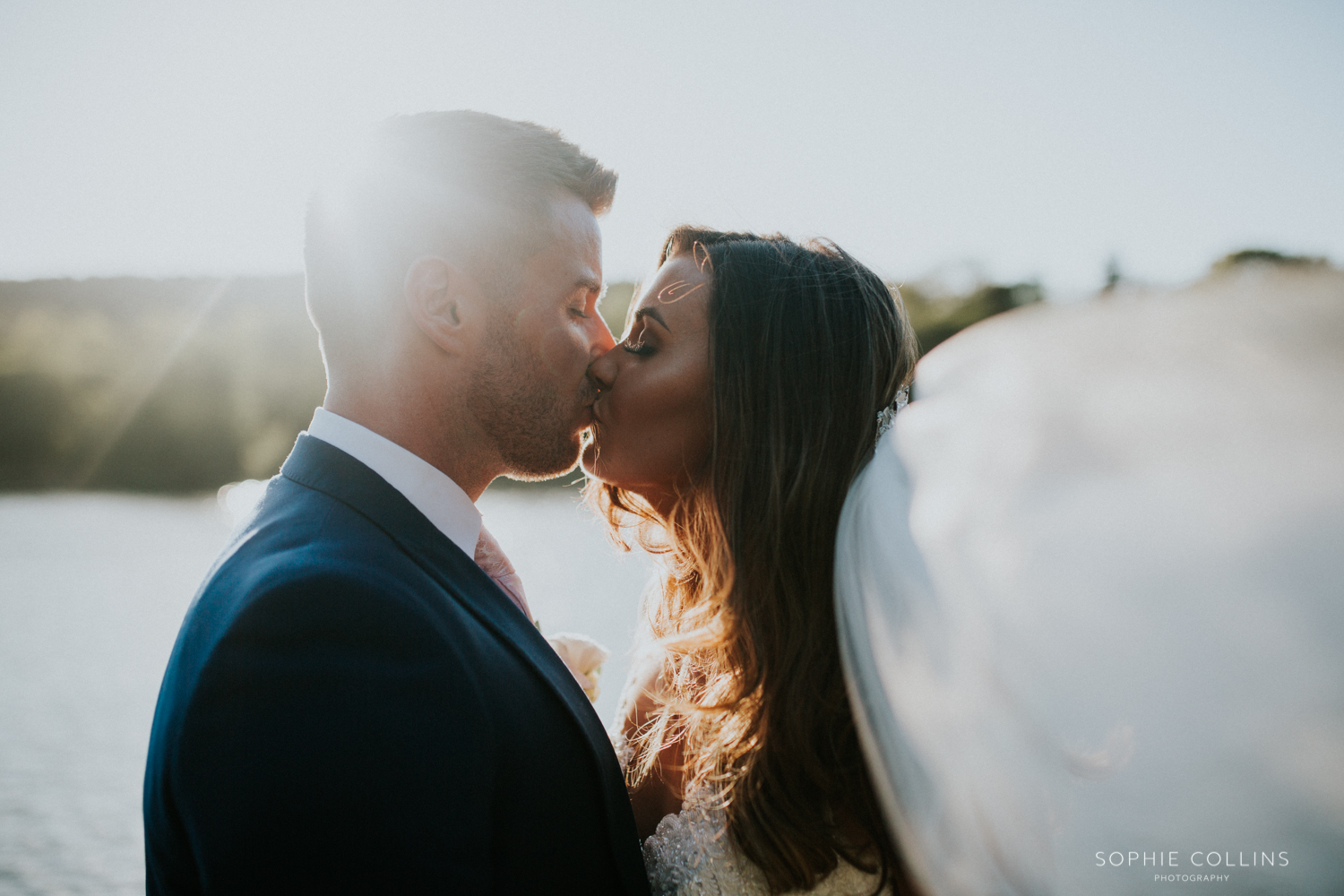 bride and groom kissing