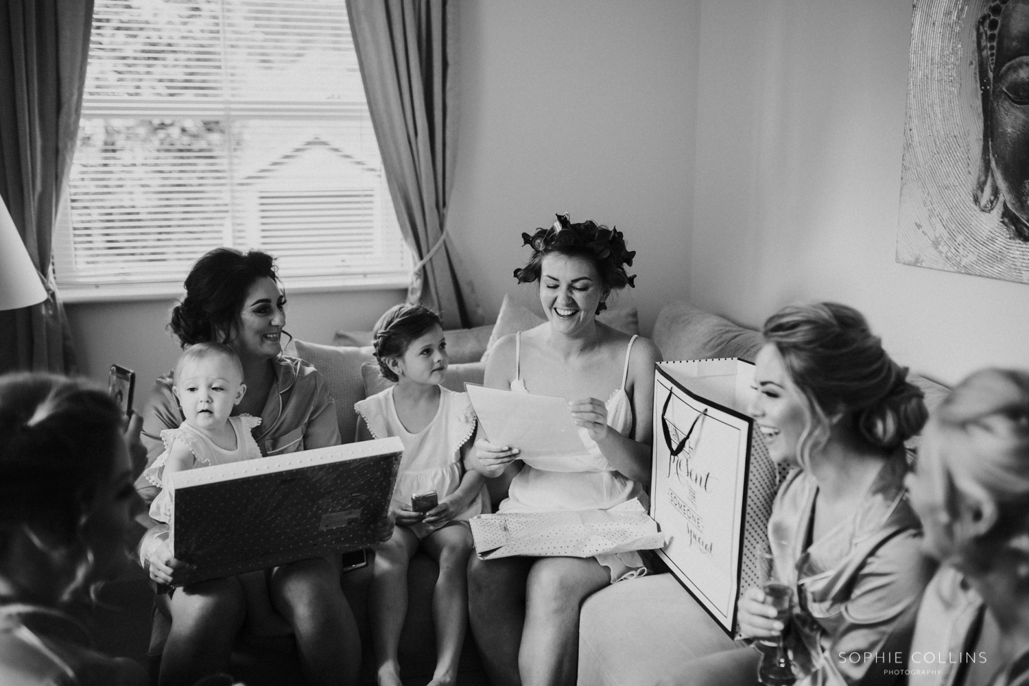 bride opening gifts 
