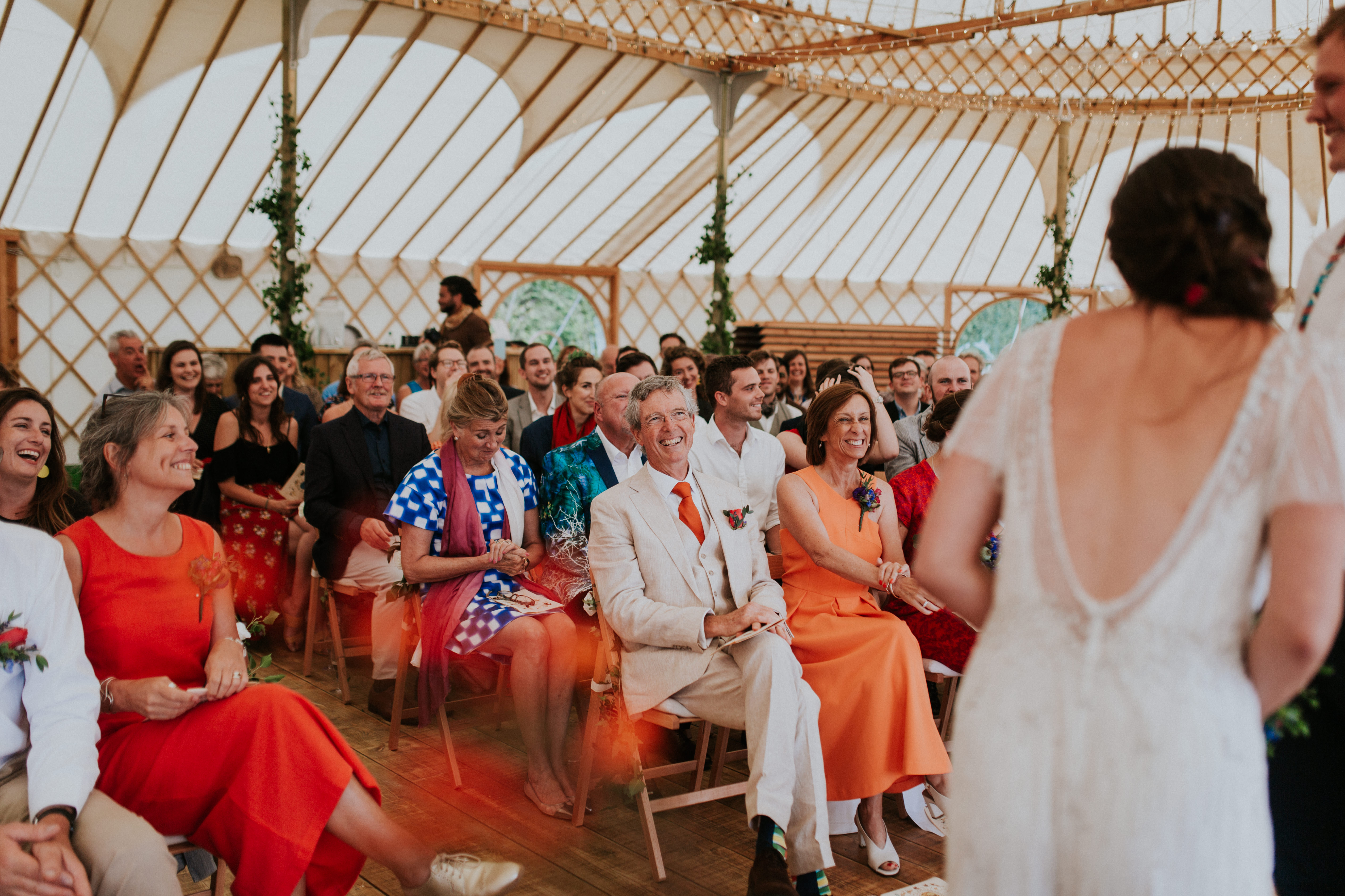 parents of the bride smiling 