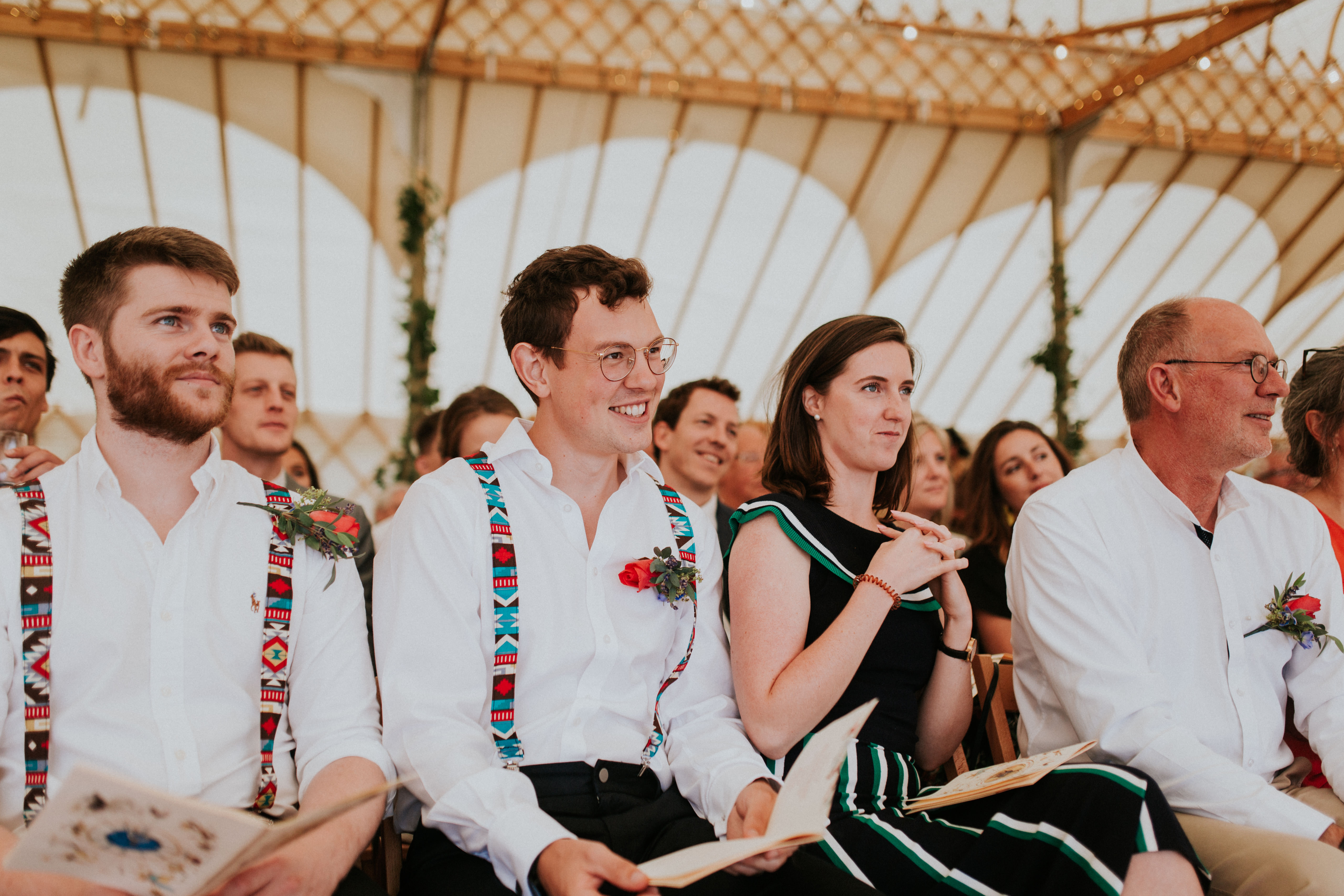 brother of the bride smiling 