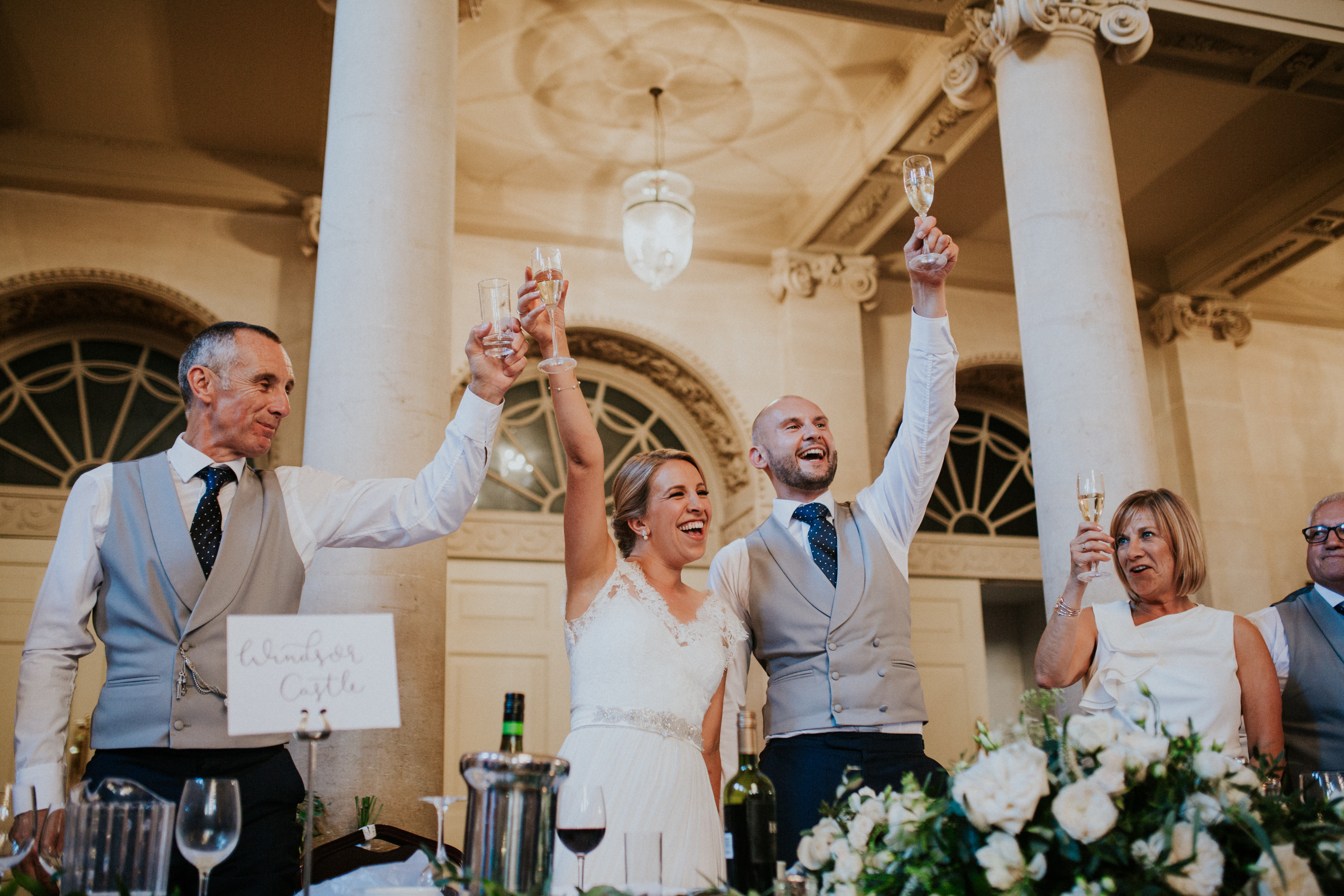 bride and groom cheering 