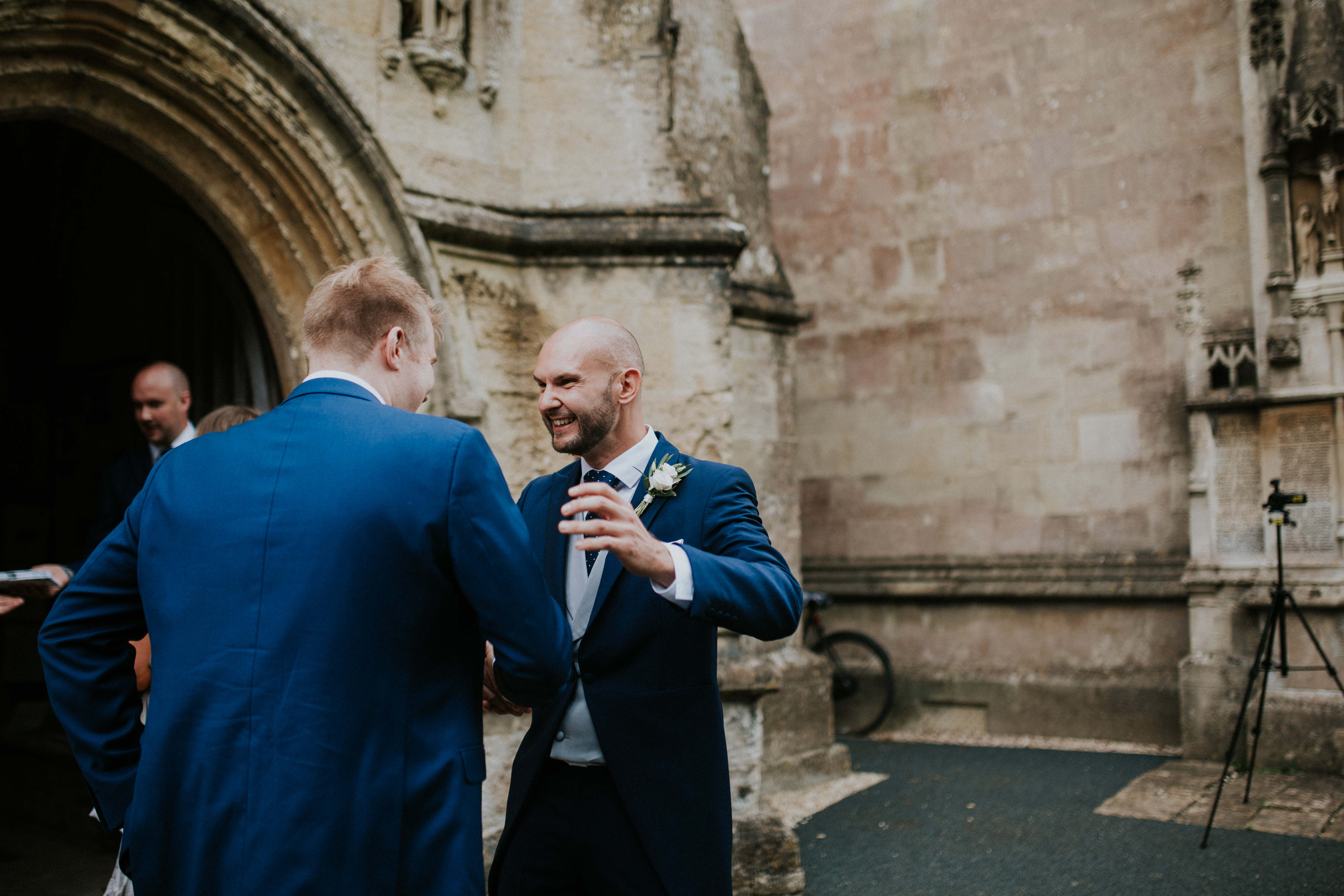 groom greeting guests 