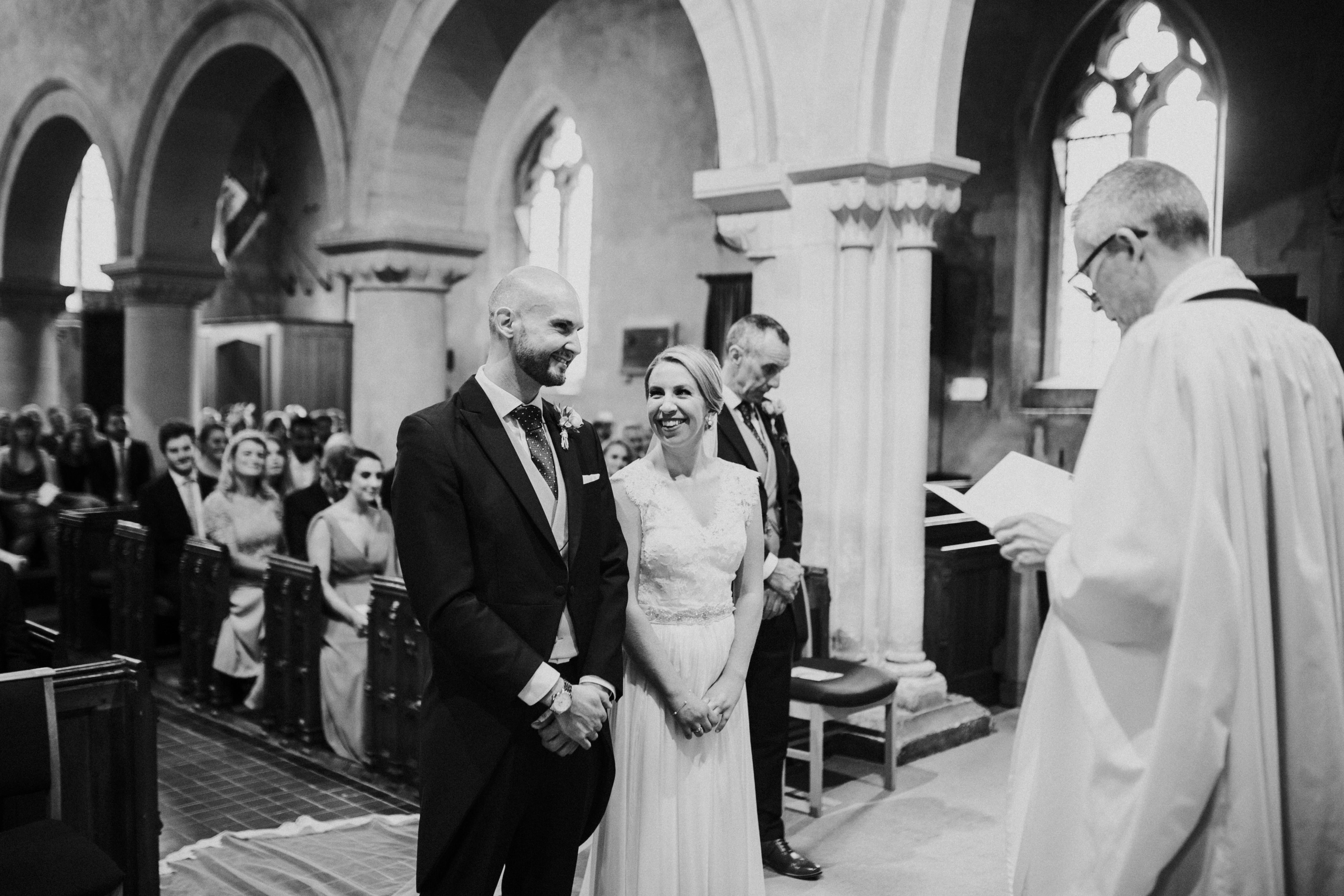 bride and groom smiling 