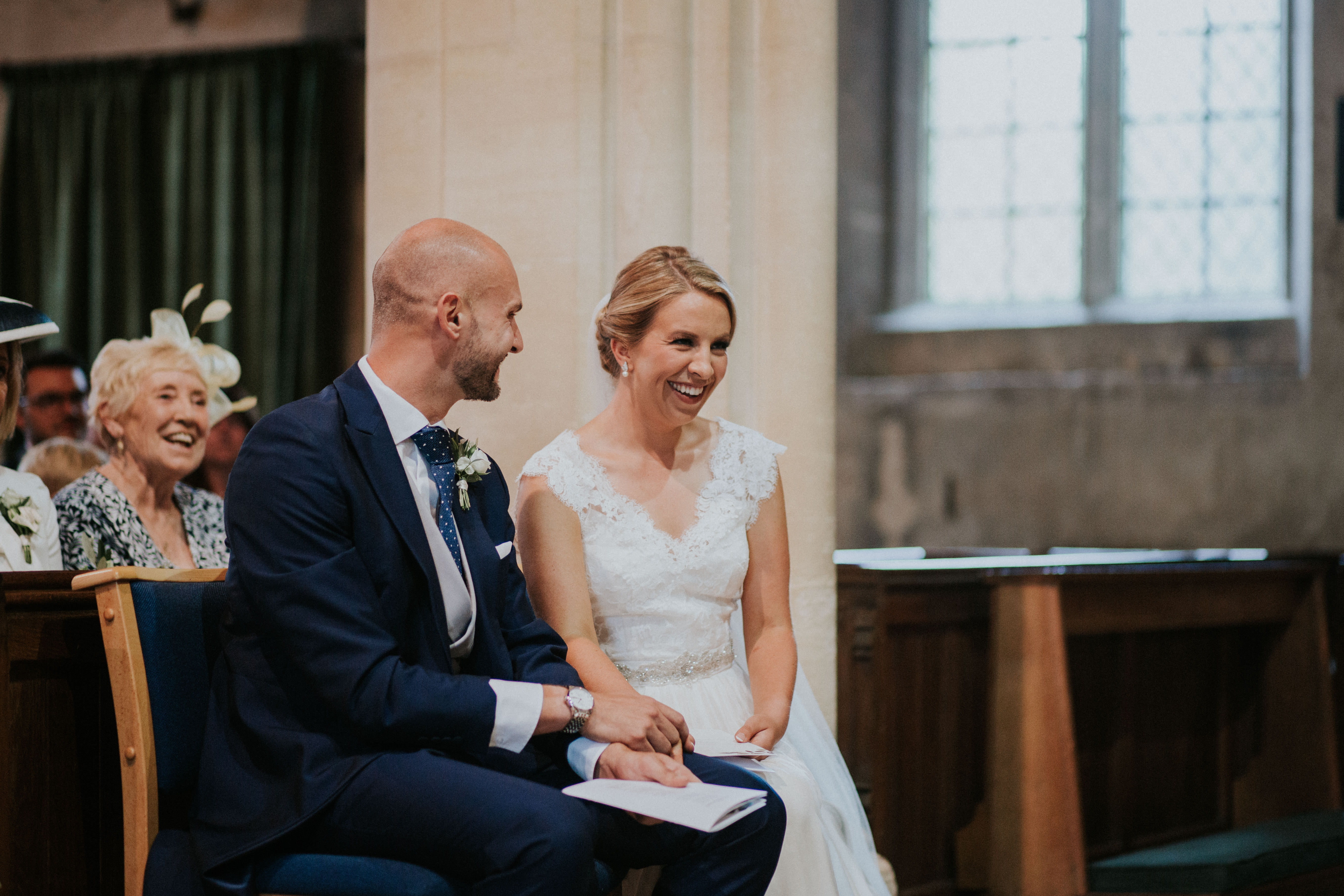 bride and groom smiling 