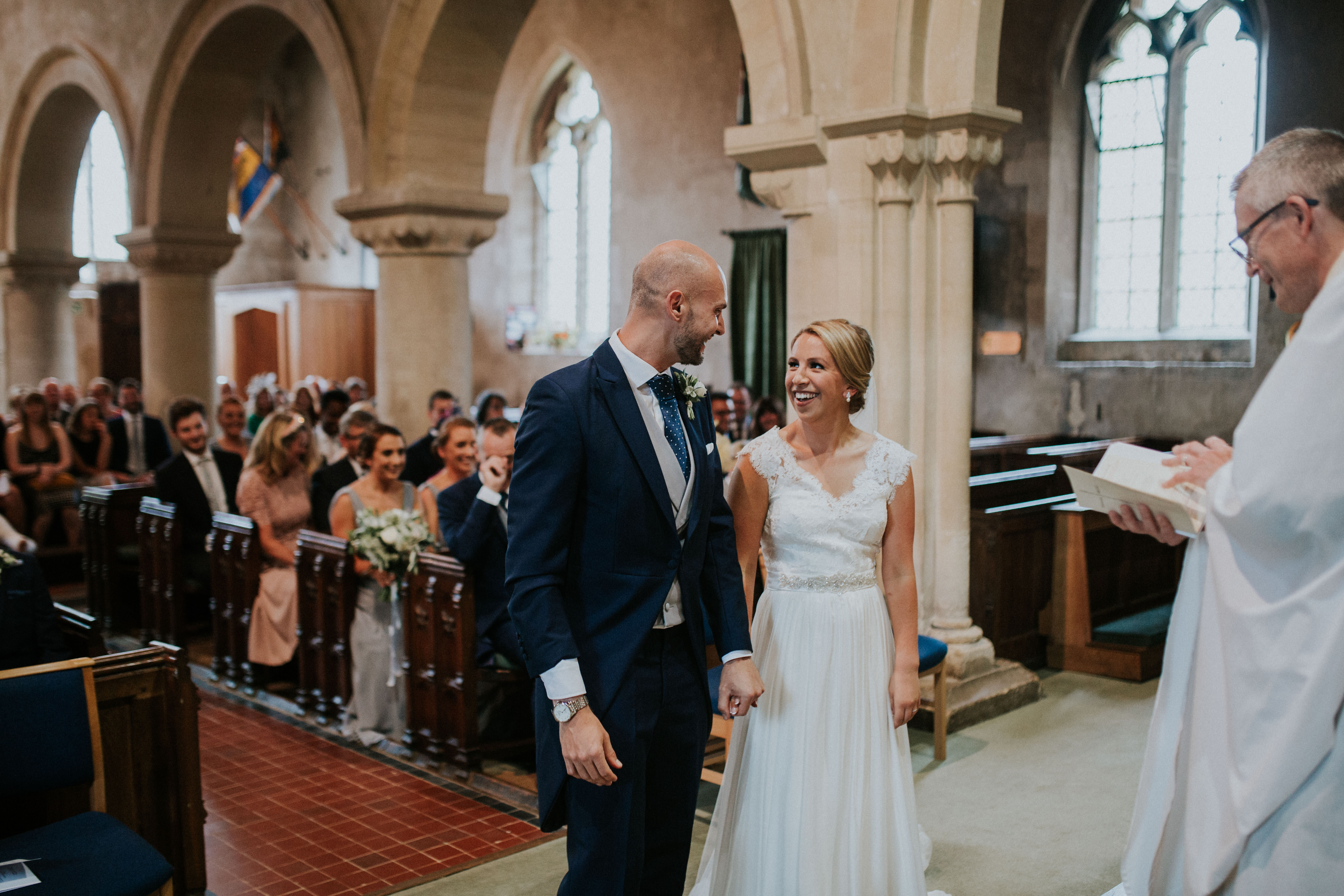 bride and groom smiling 