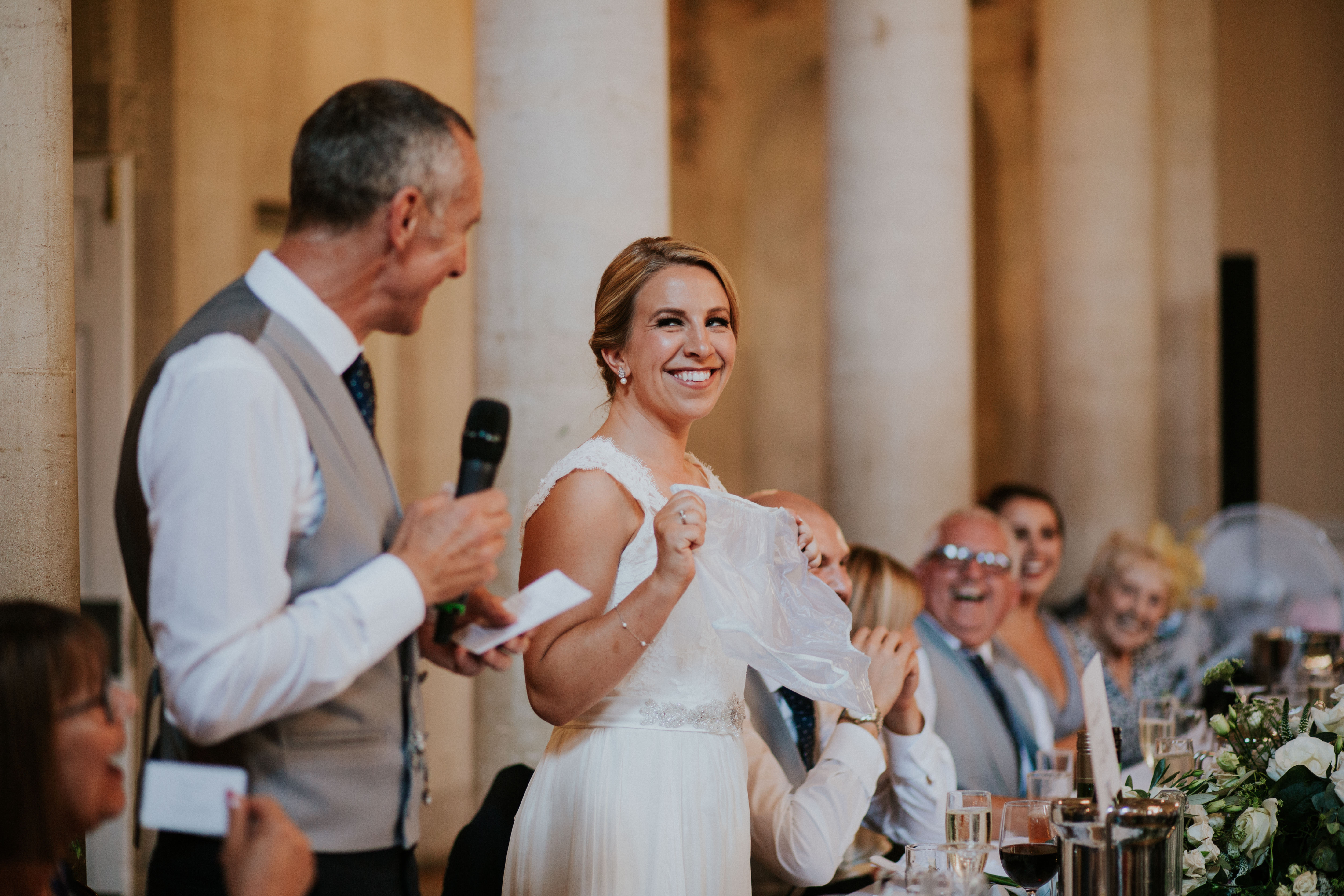 bride laughing at dad 