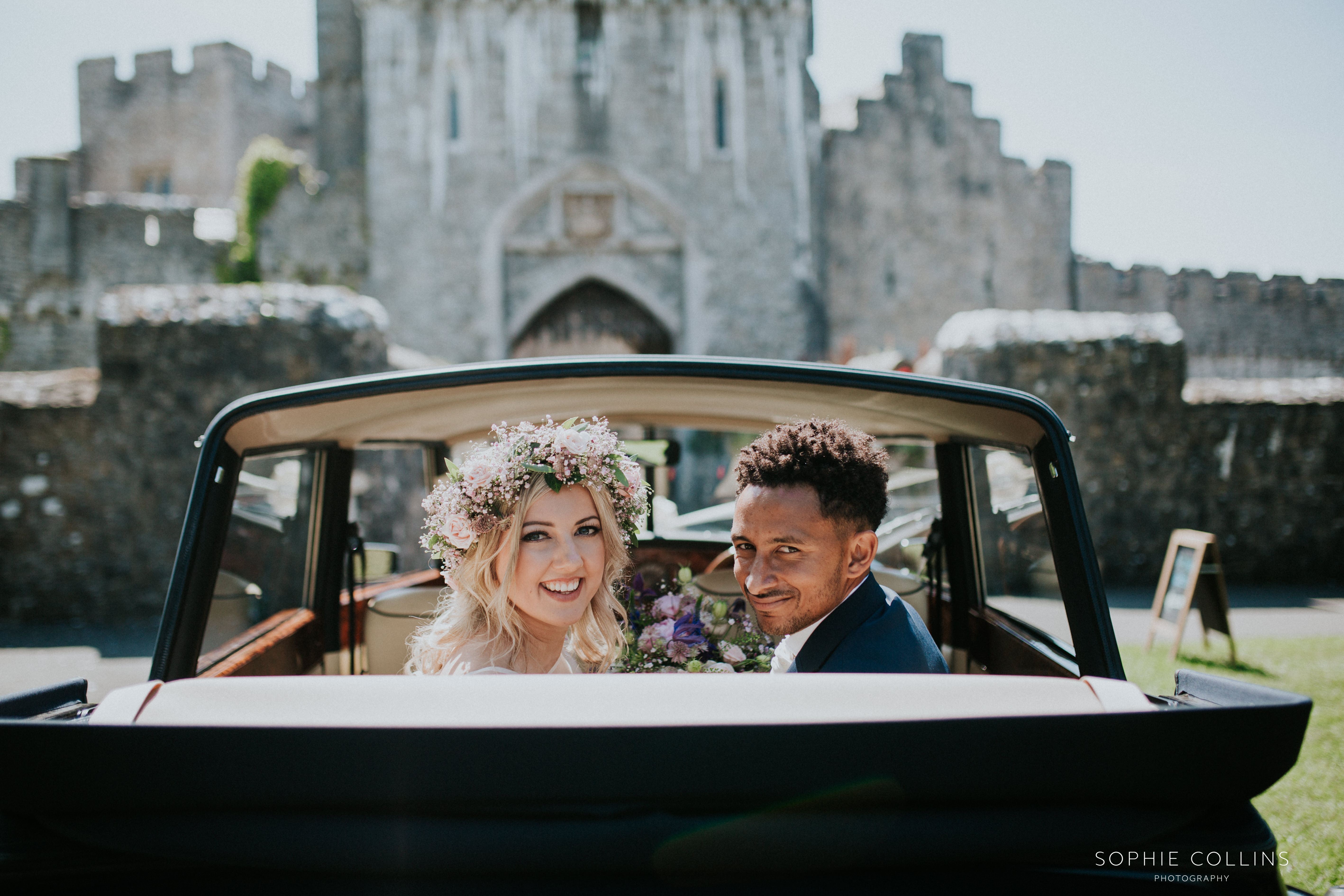 bride and groom In the car 