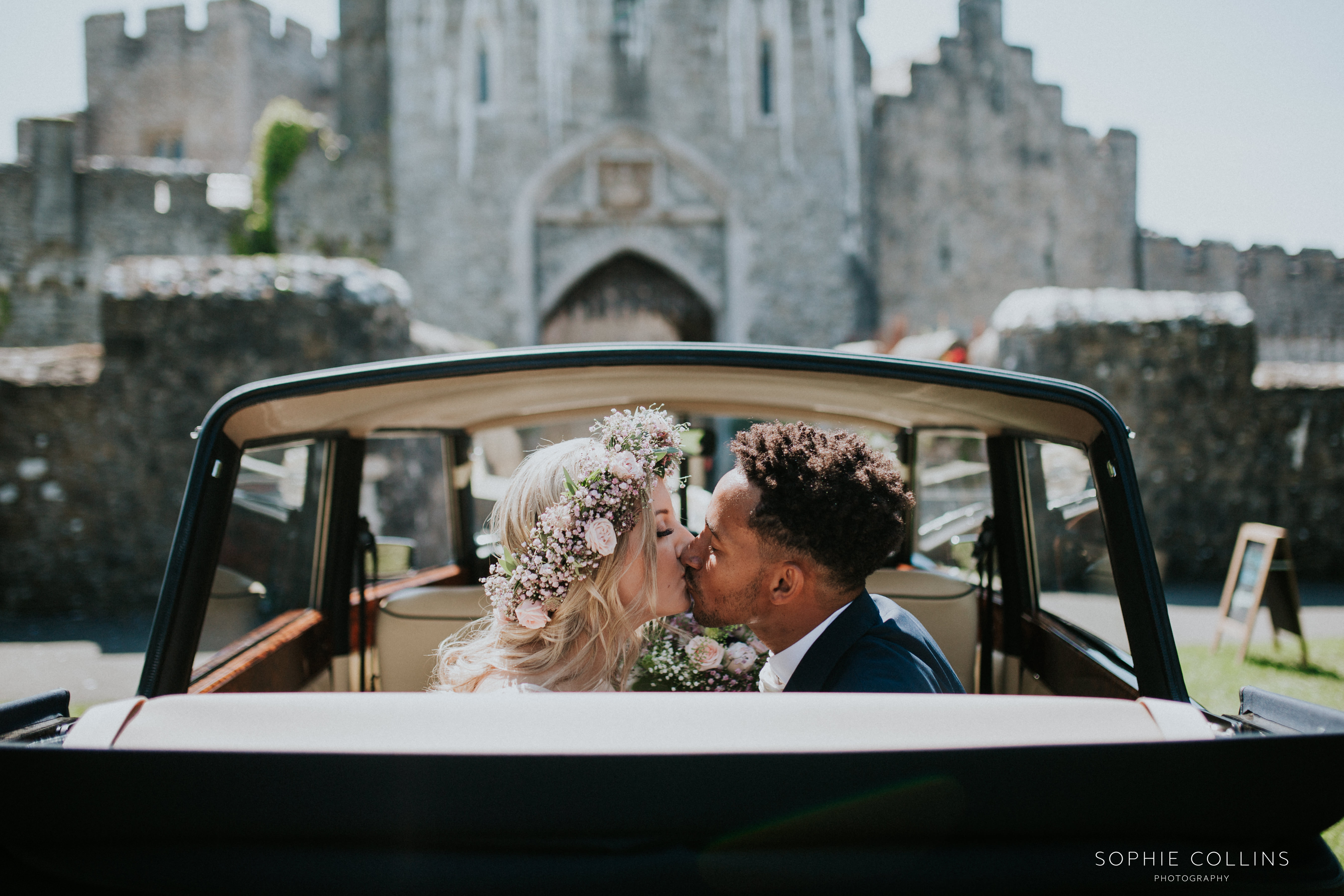 bride and groom in car 