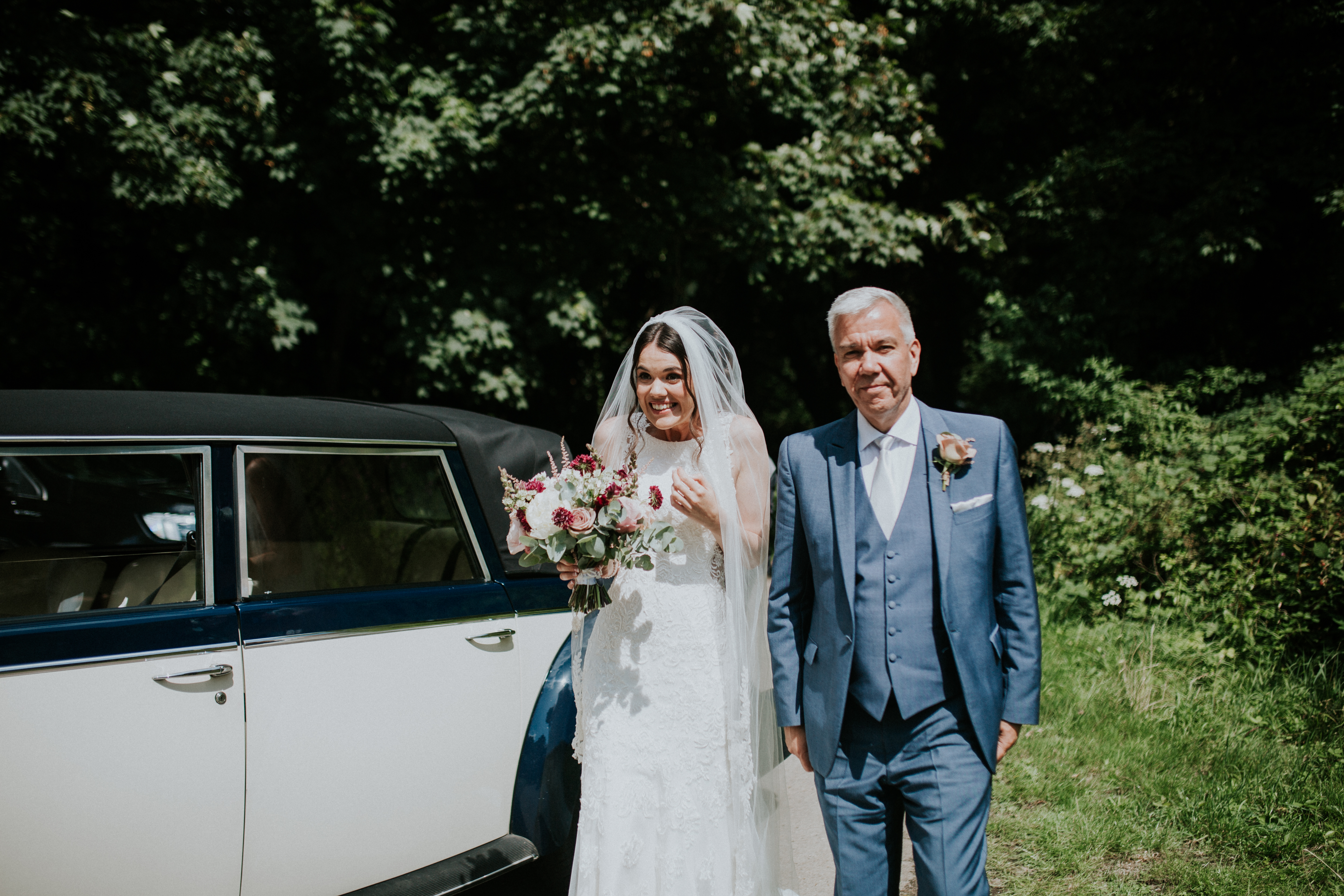 bride getting out of car