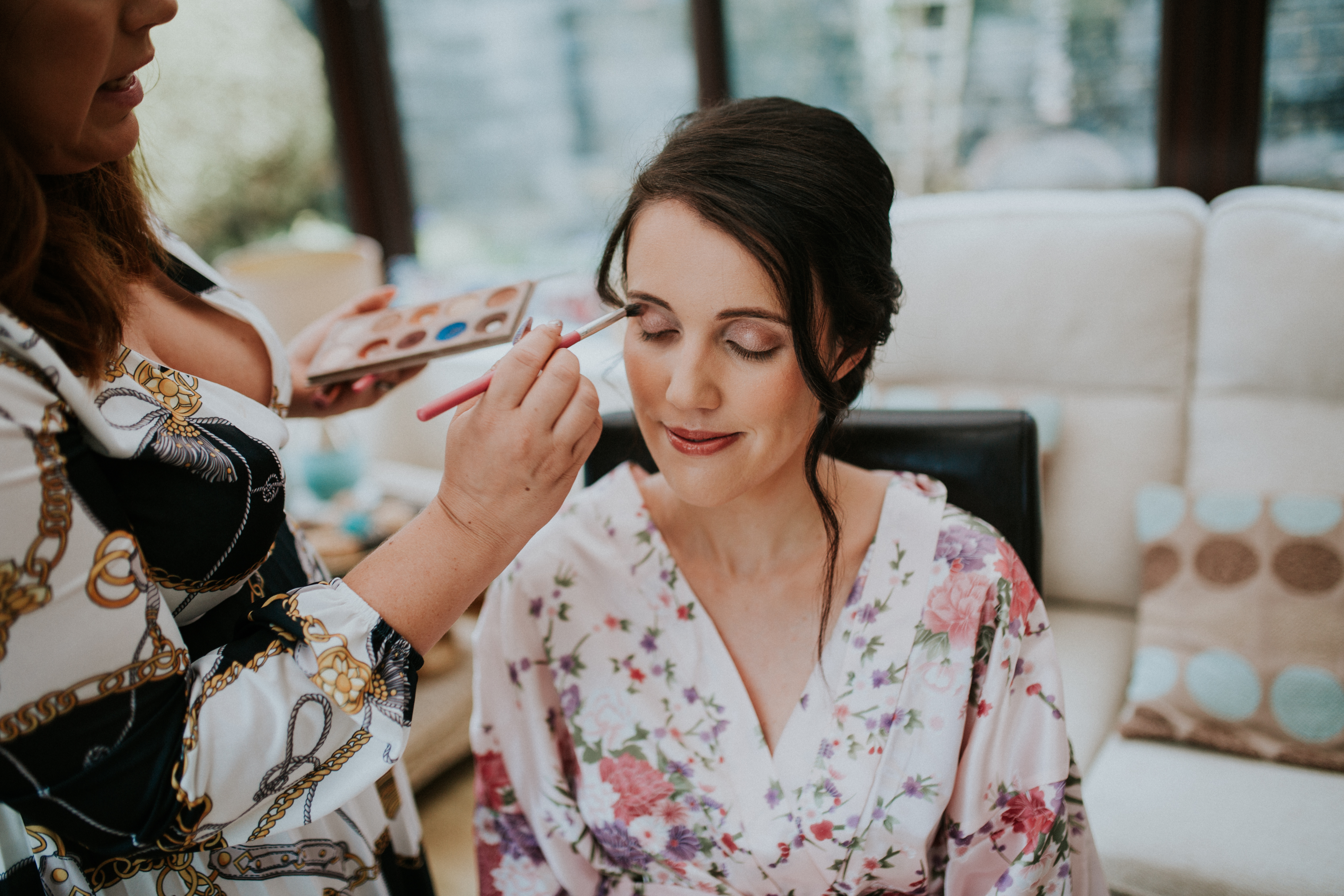 maid of honour having her make-up done 
