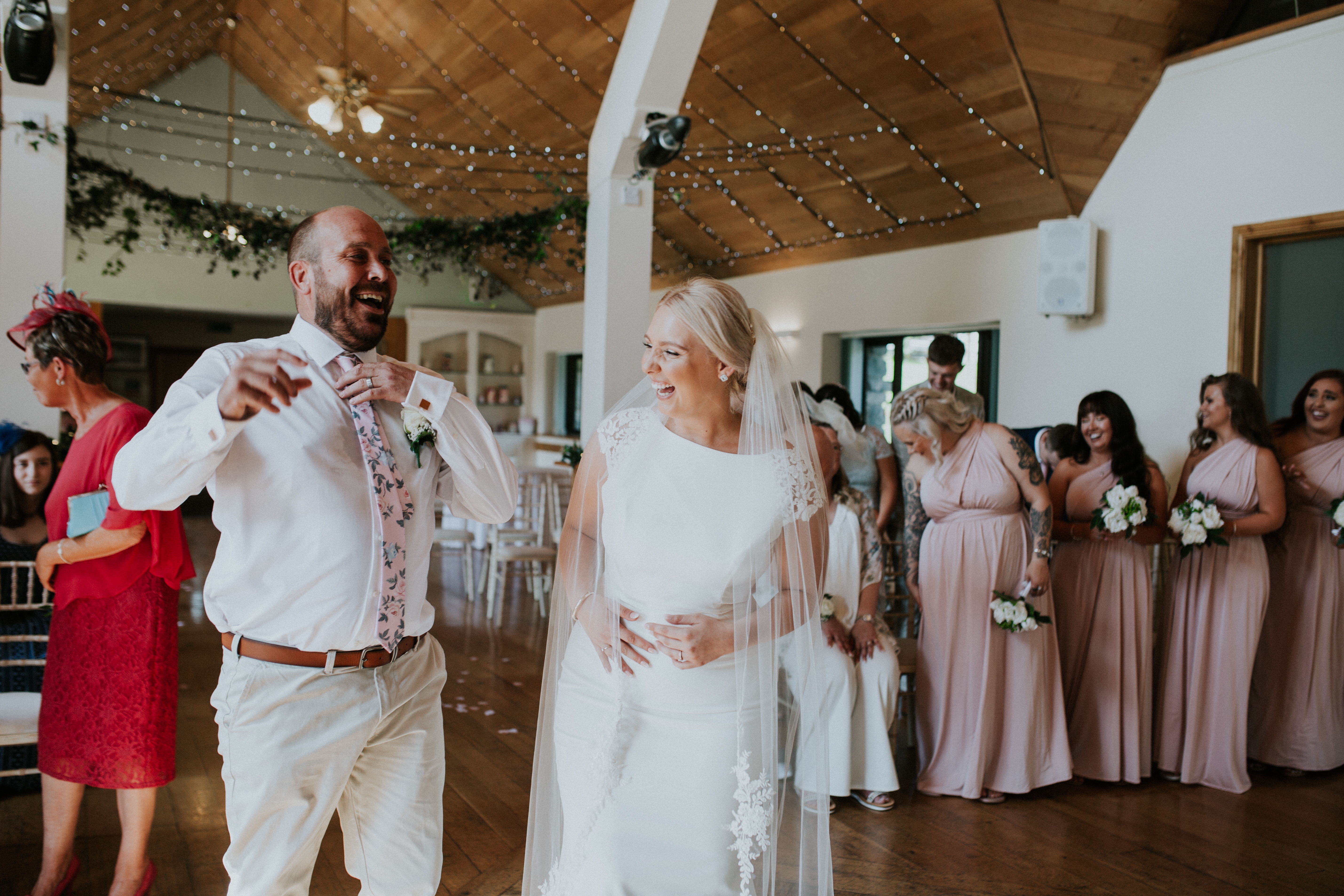 bride and groom laughing