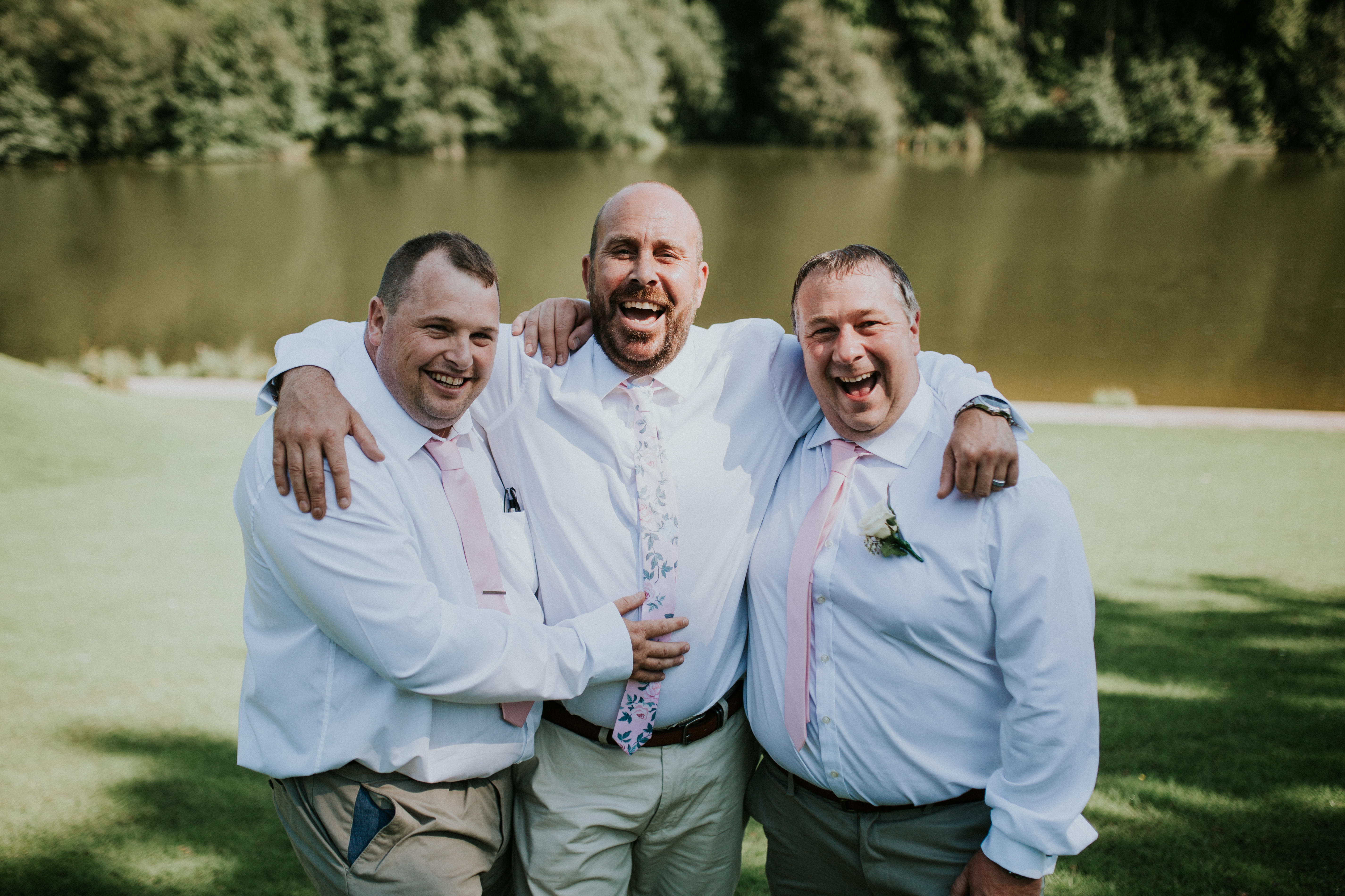 groomsmen smiling