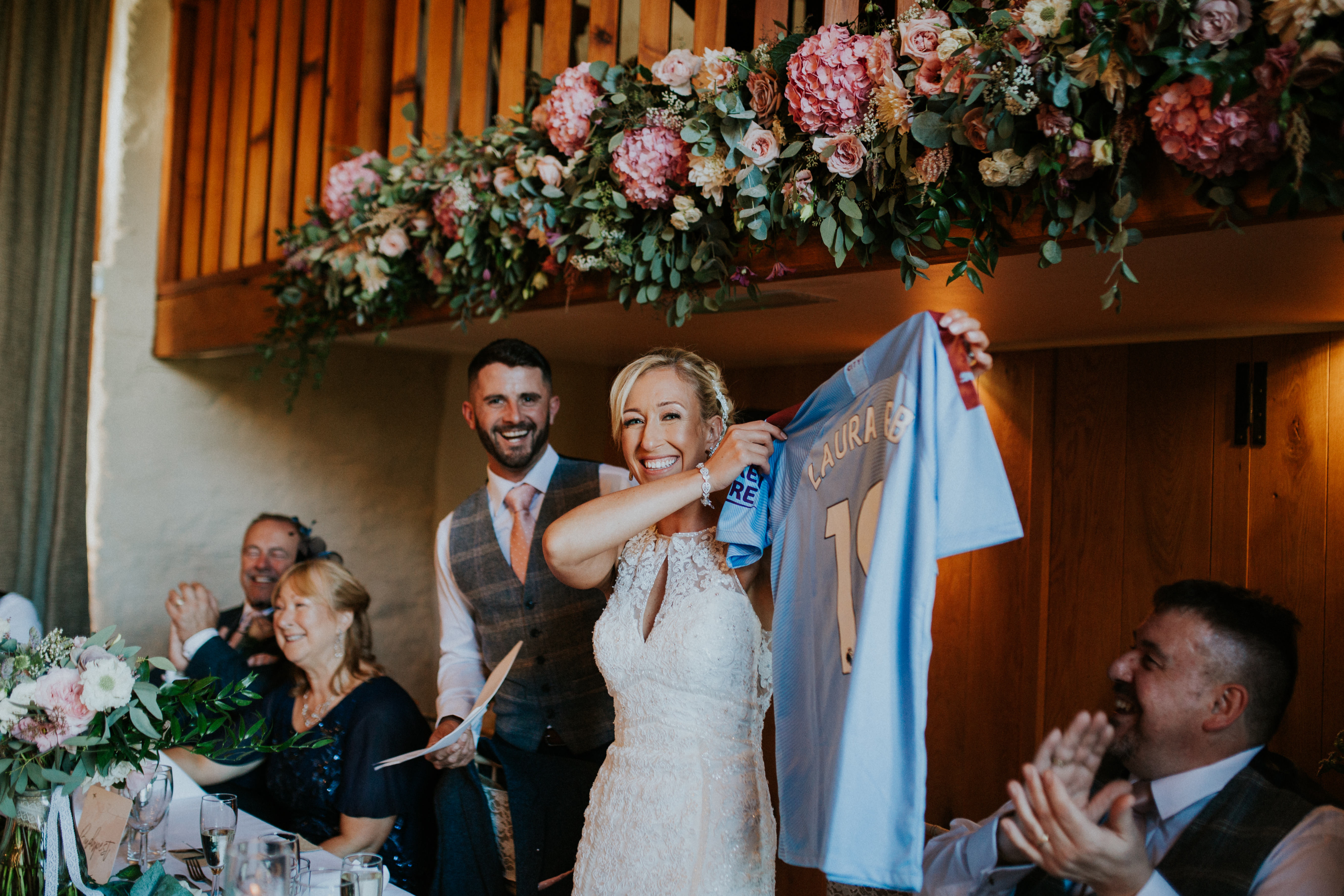 bride holding top up 