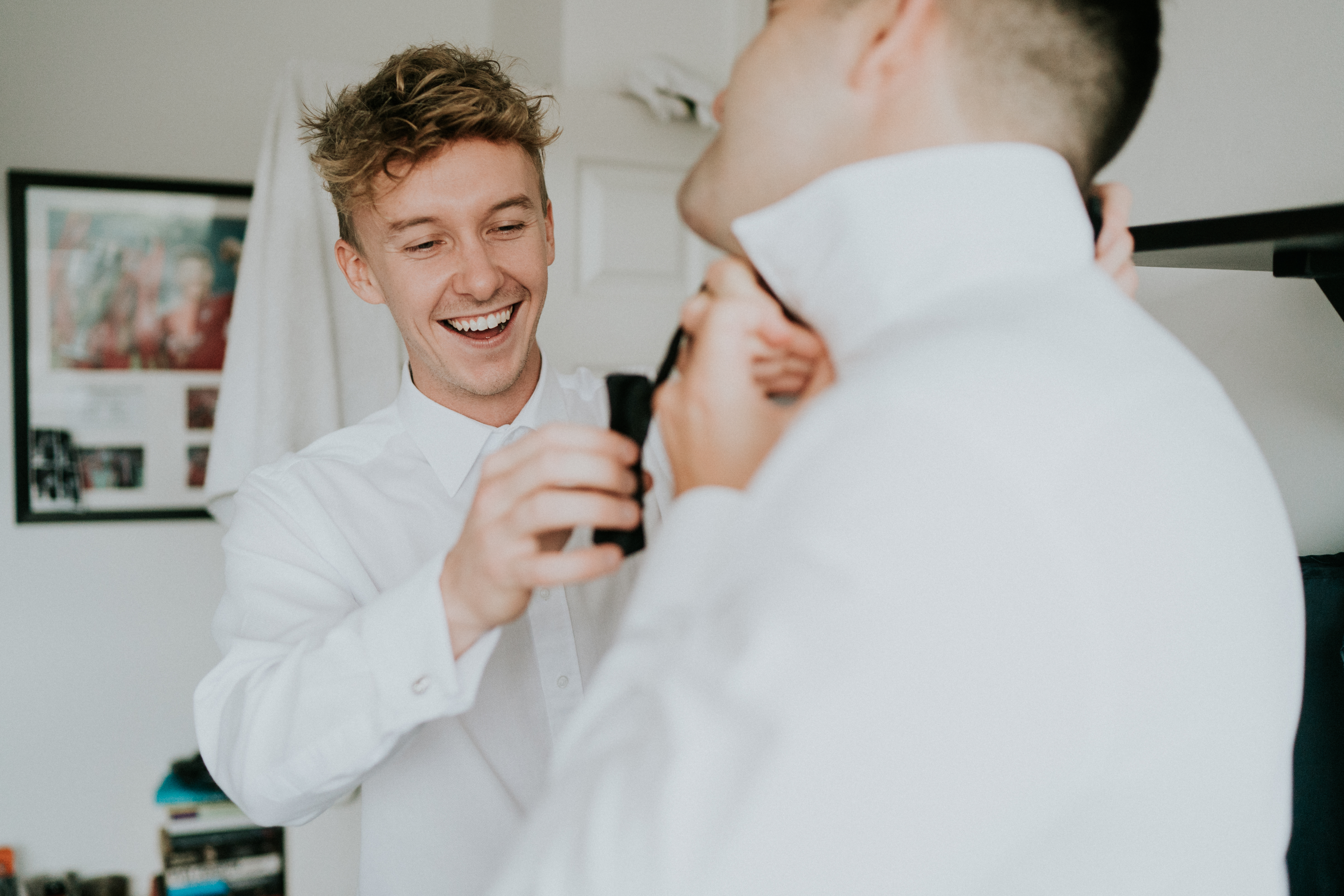 putting on tie 