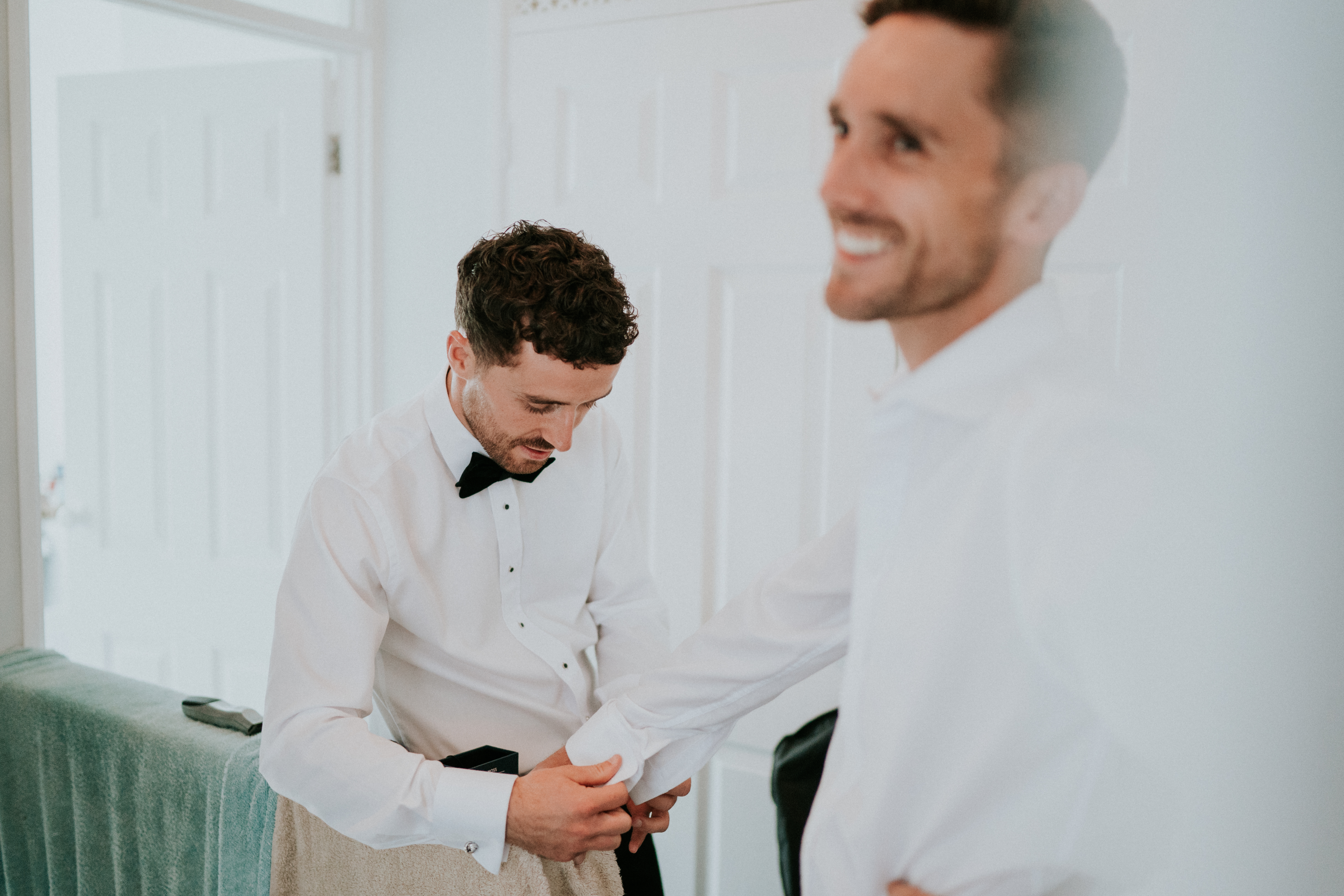 groomsmen laughing 