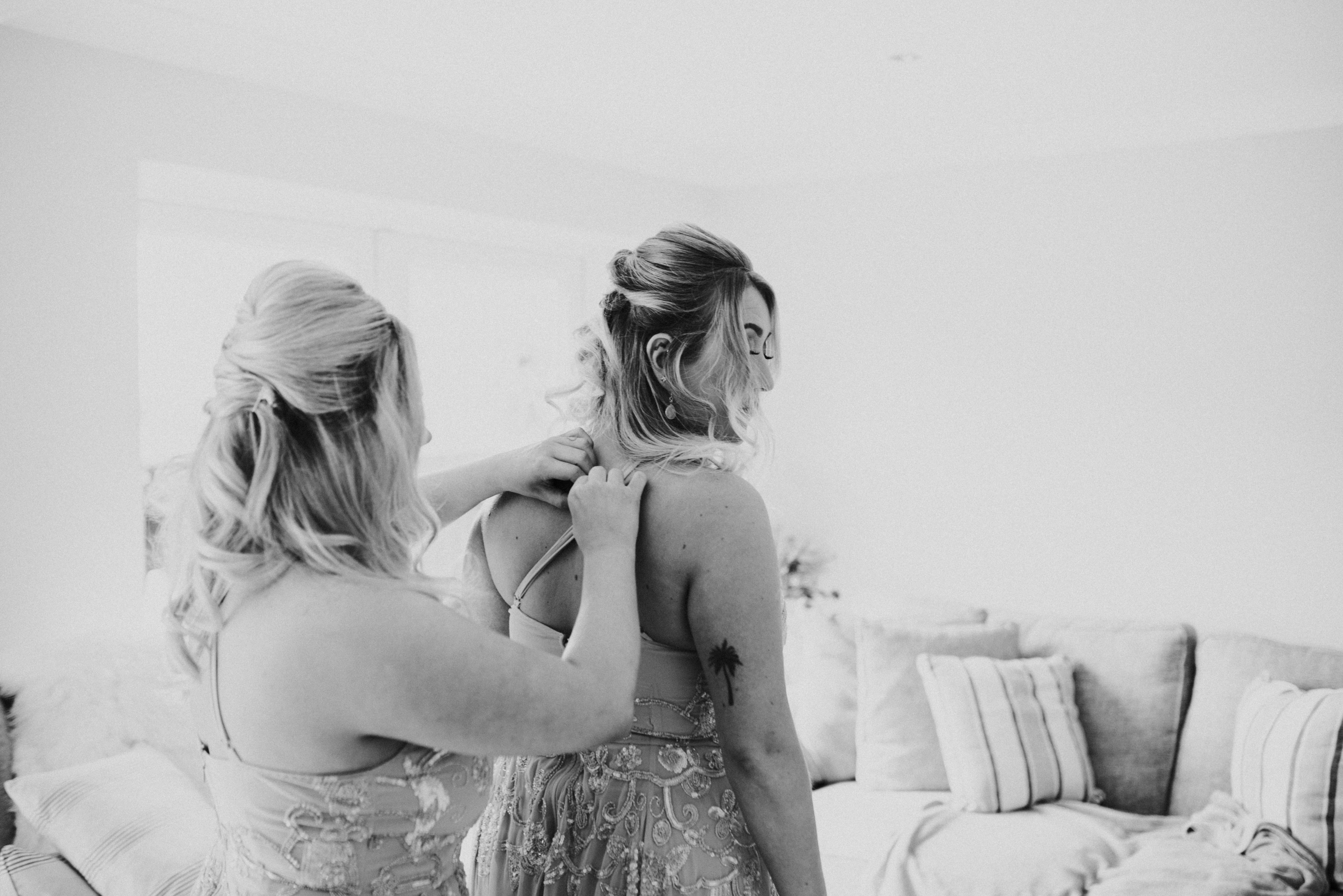 bridesmaids doing dressing 