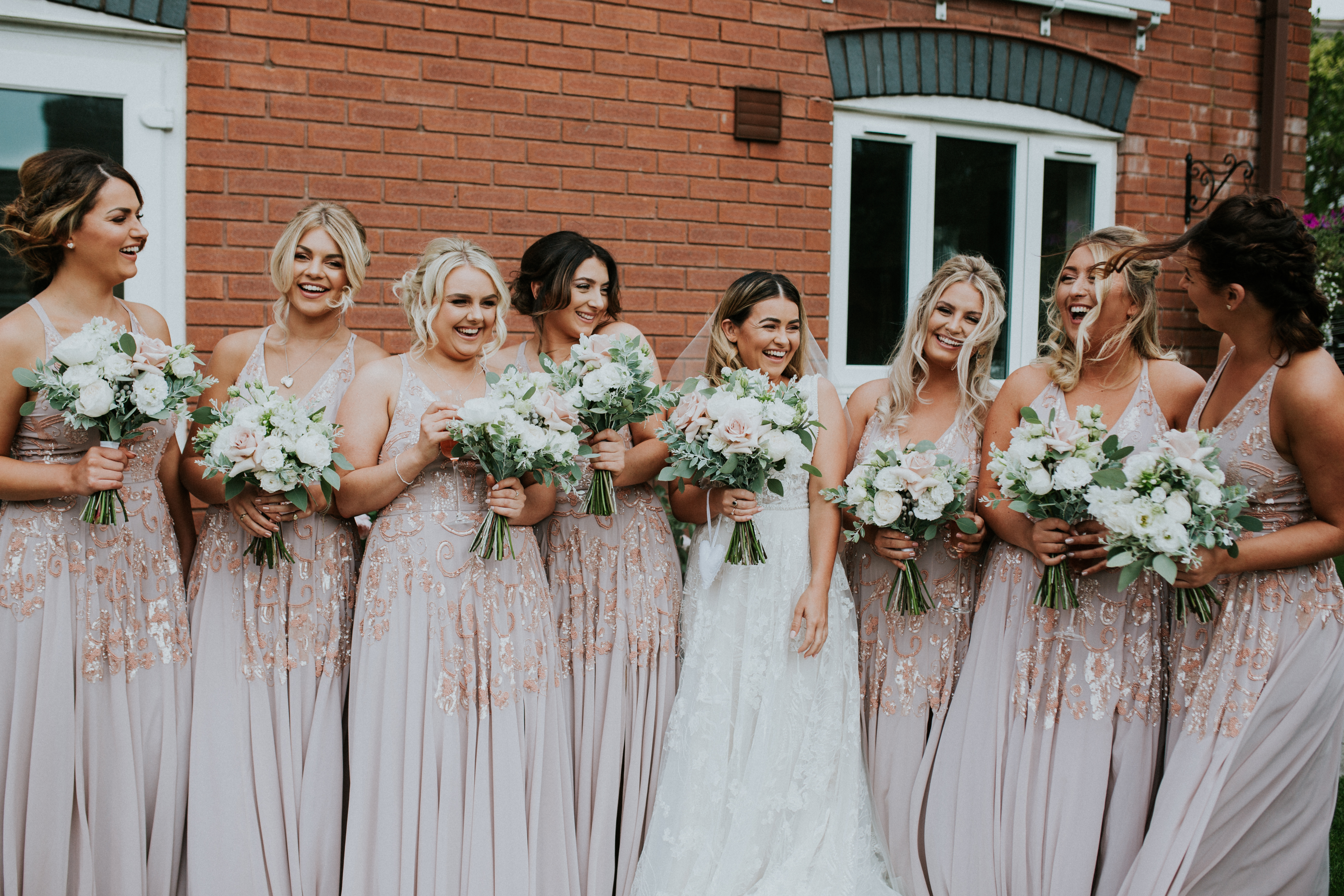 bridesmaids laughing 