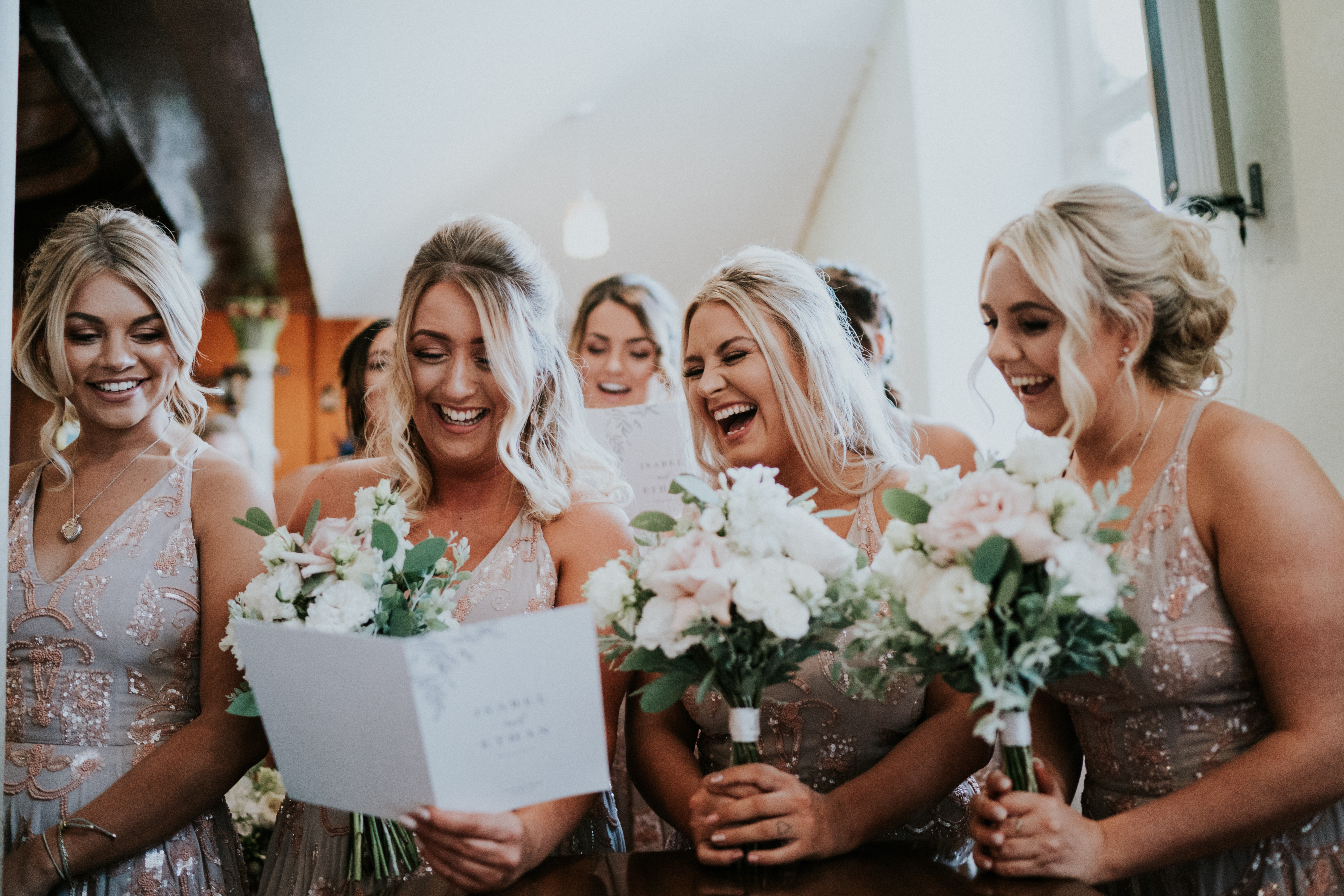 bridesmaids laughing 