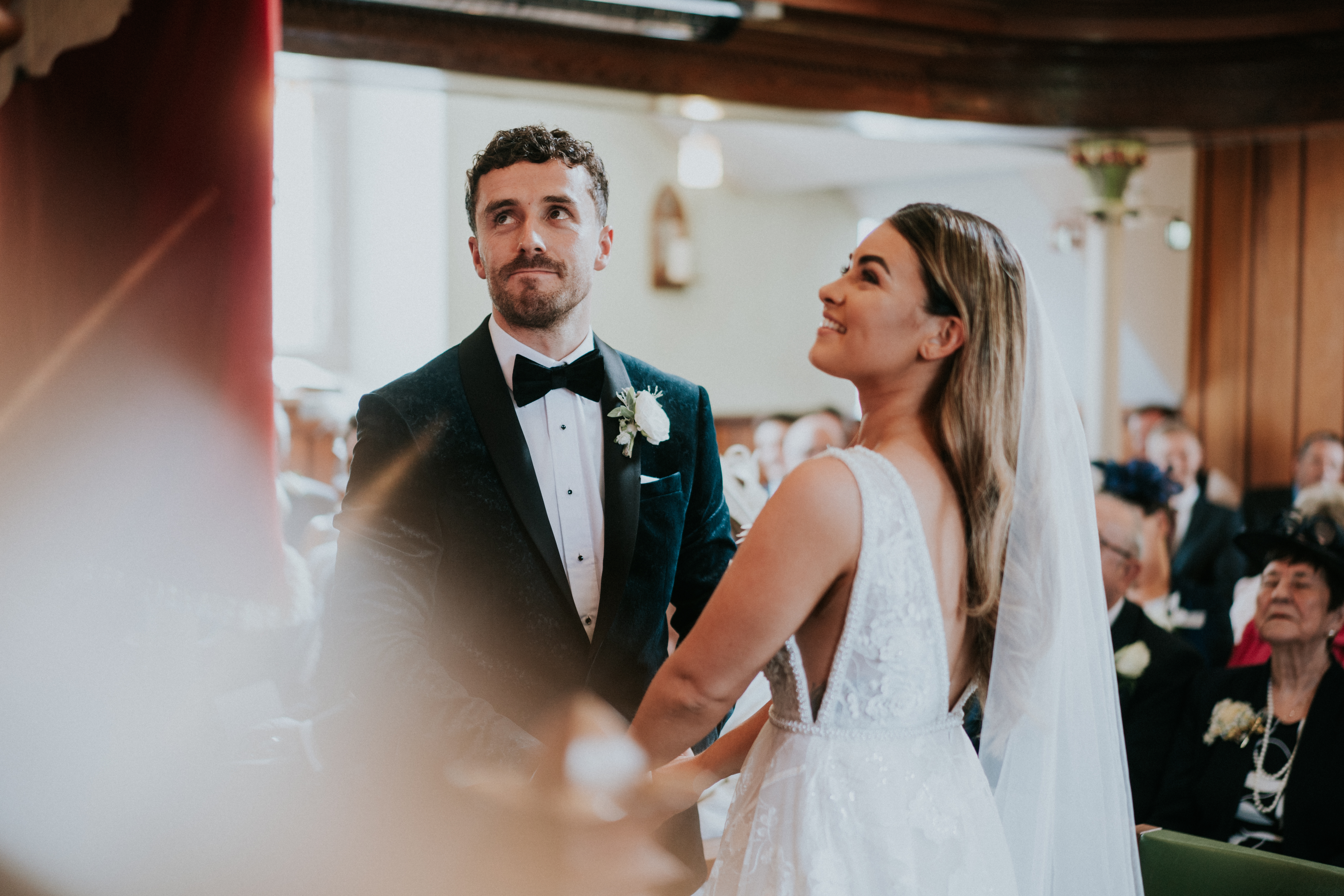 bride and groom smiling 