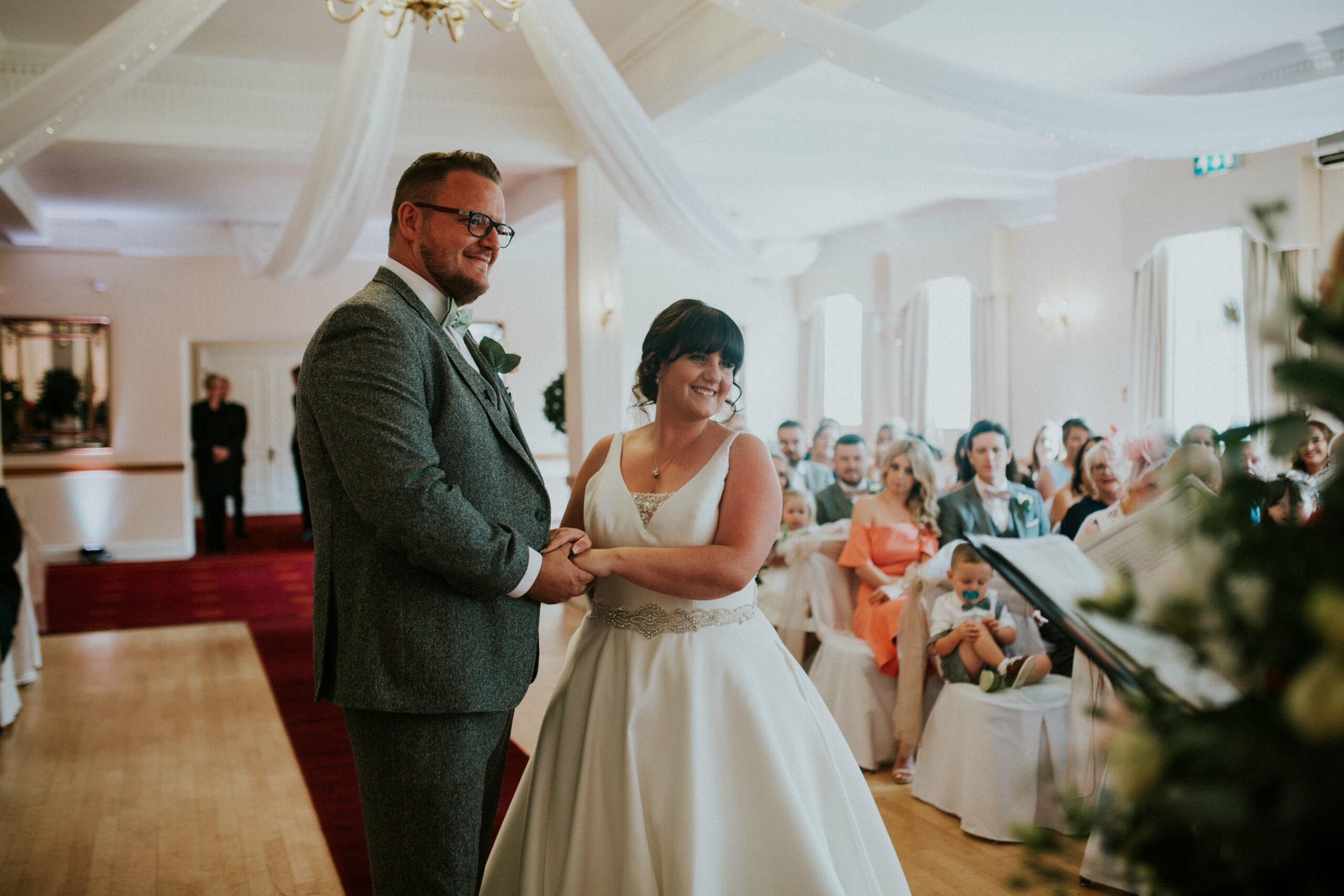 bride and groom smiling 