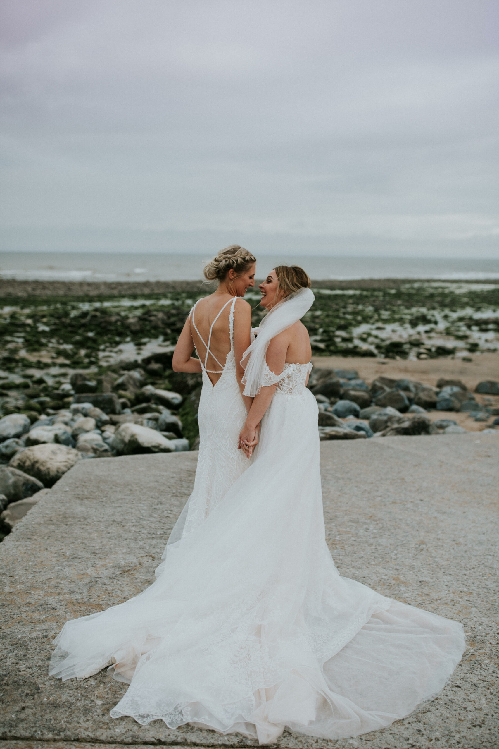 brides portraits down the beach 