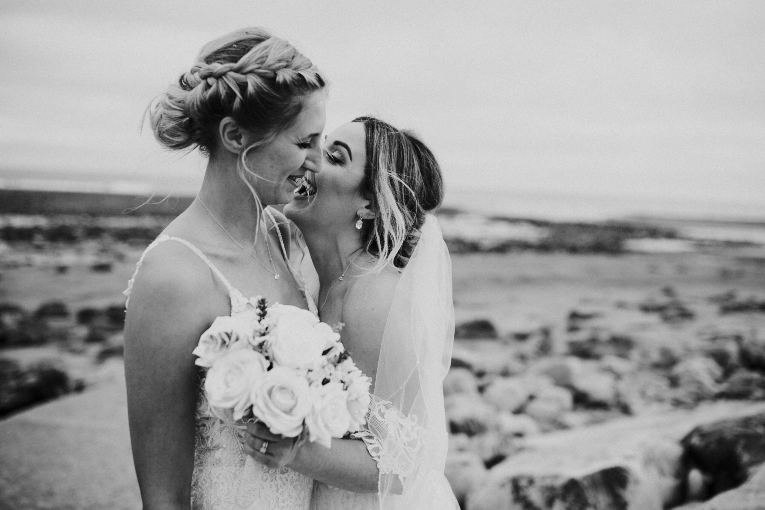 brides portraits down the beach 