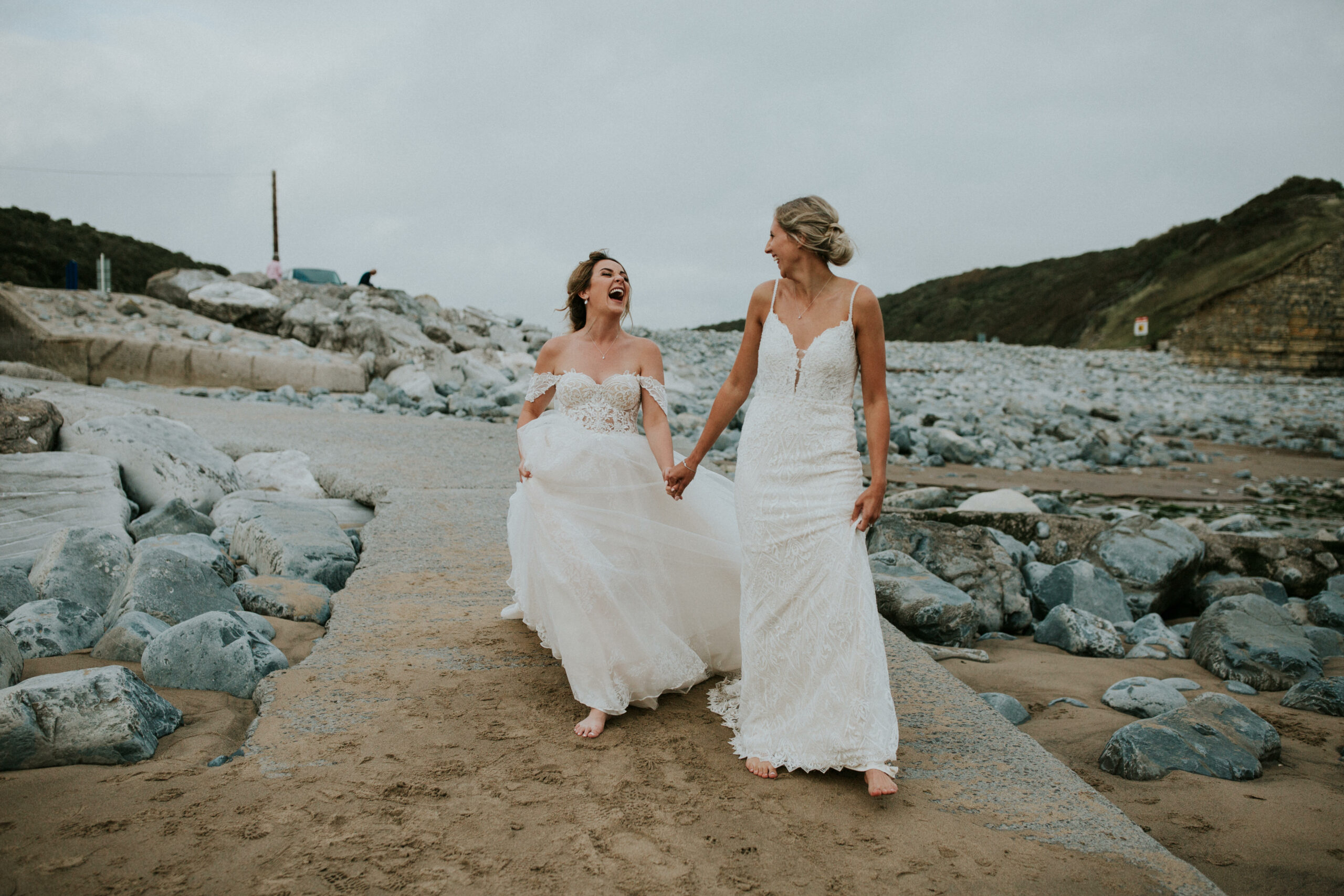 brides portraits down the beach 