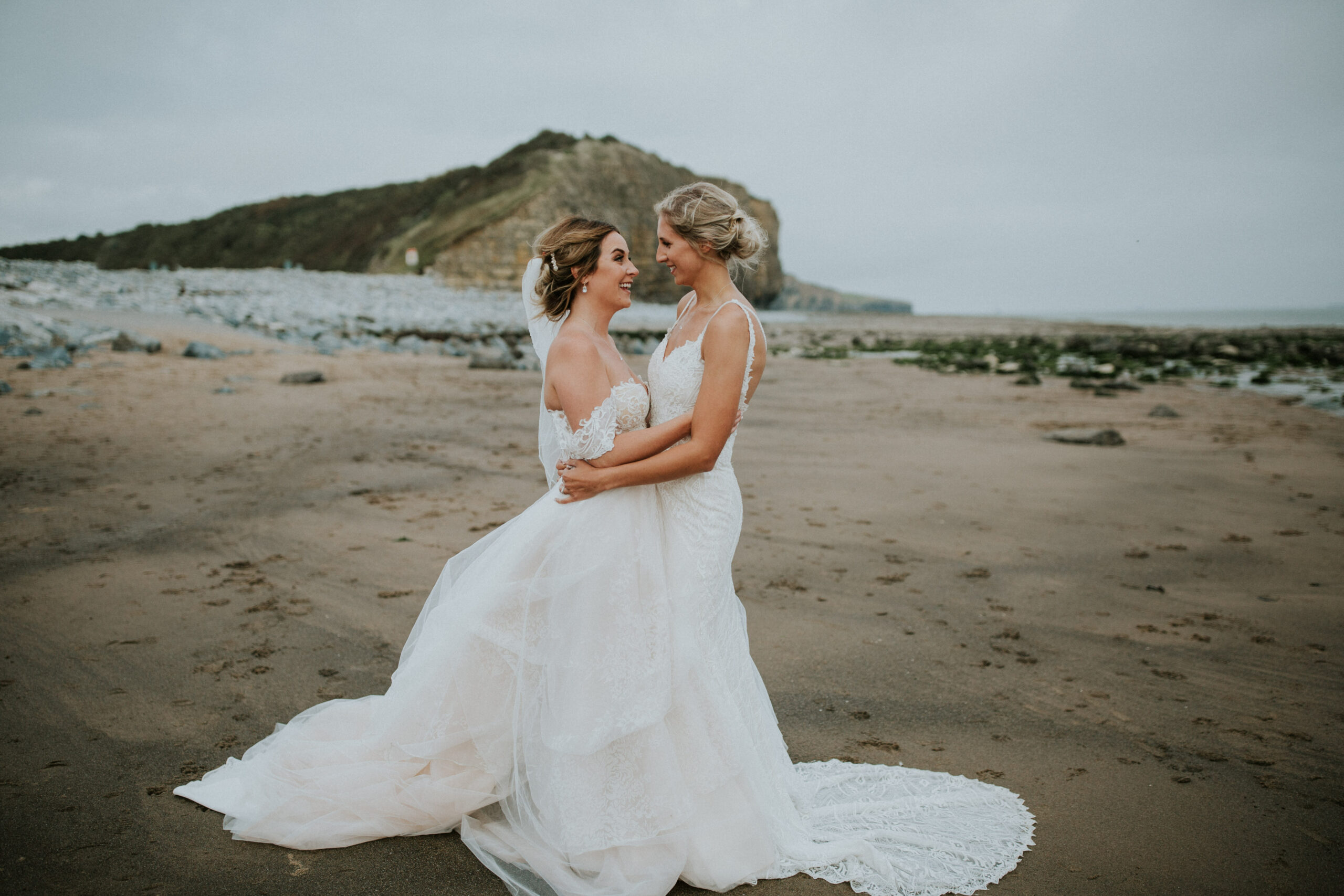 brides portraits down the beach 