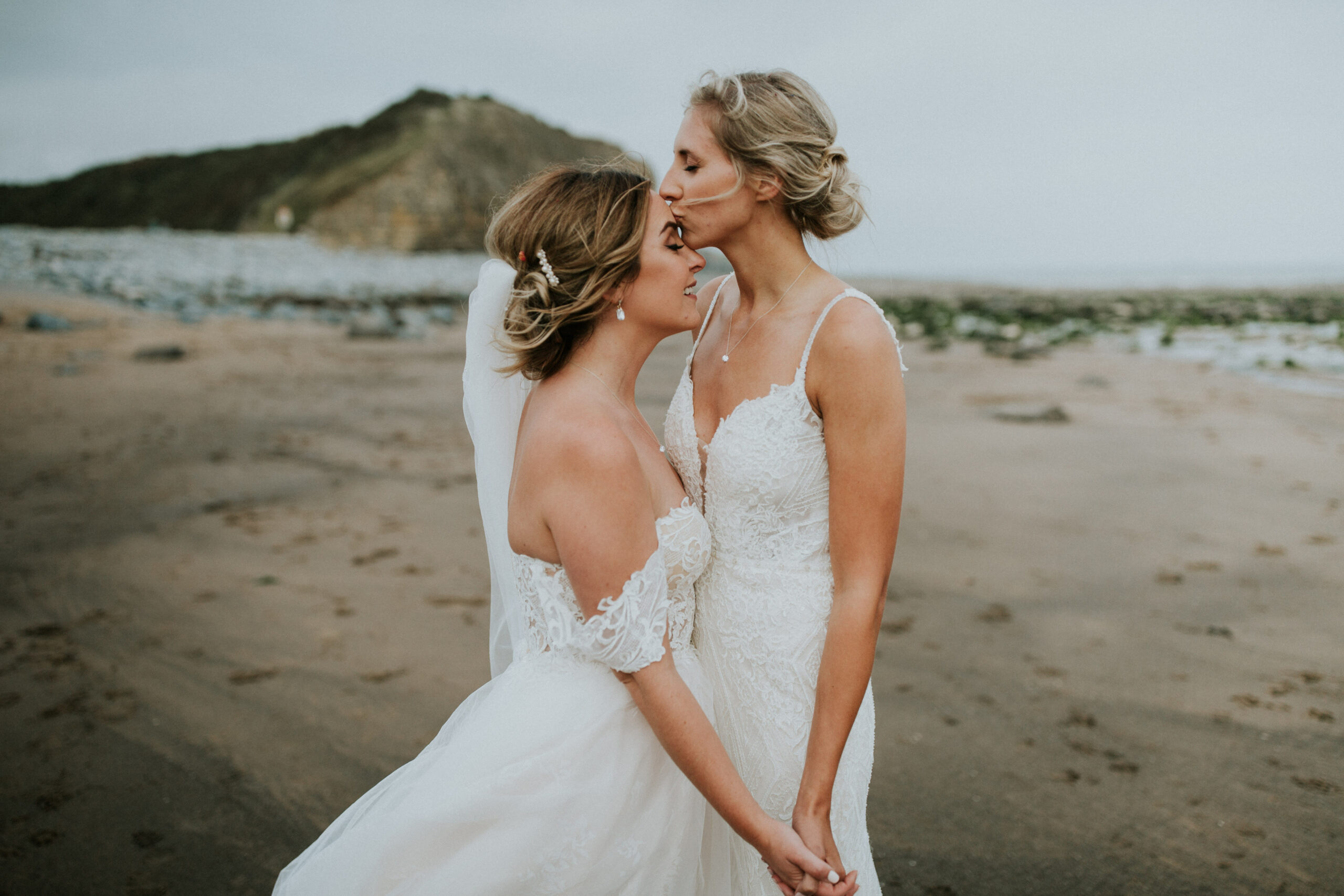 brides portraits down the beach 