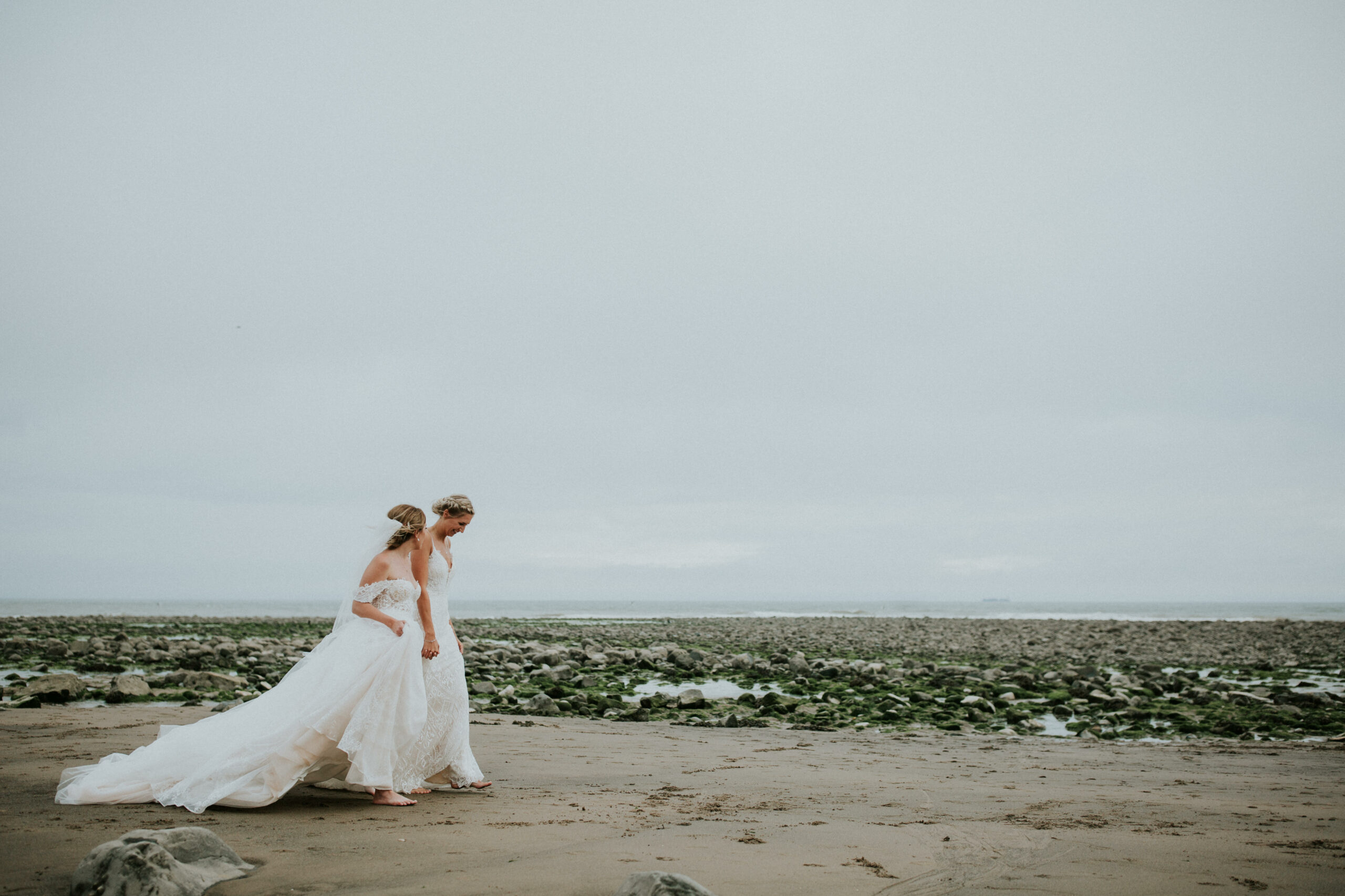 brides portraits down the beach 