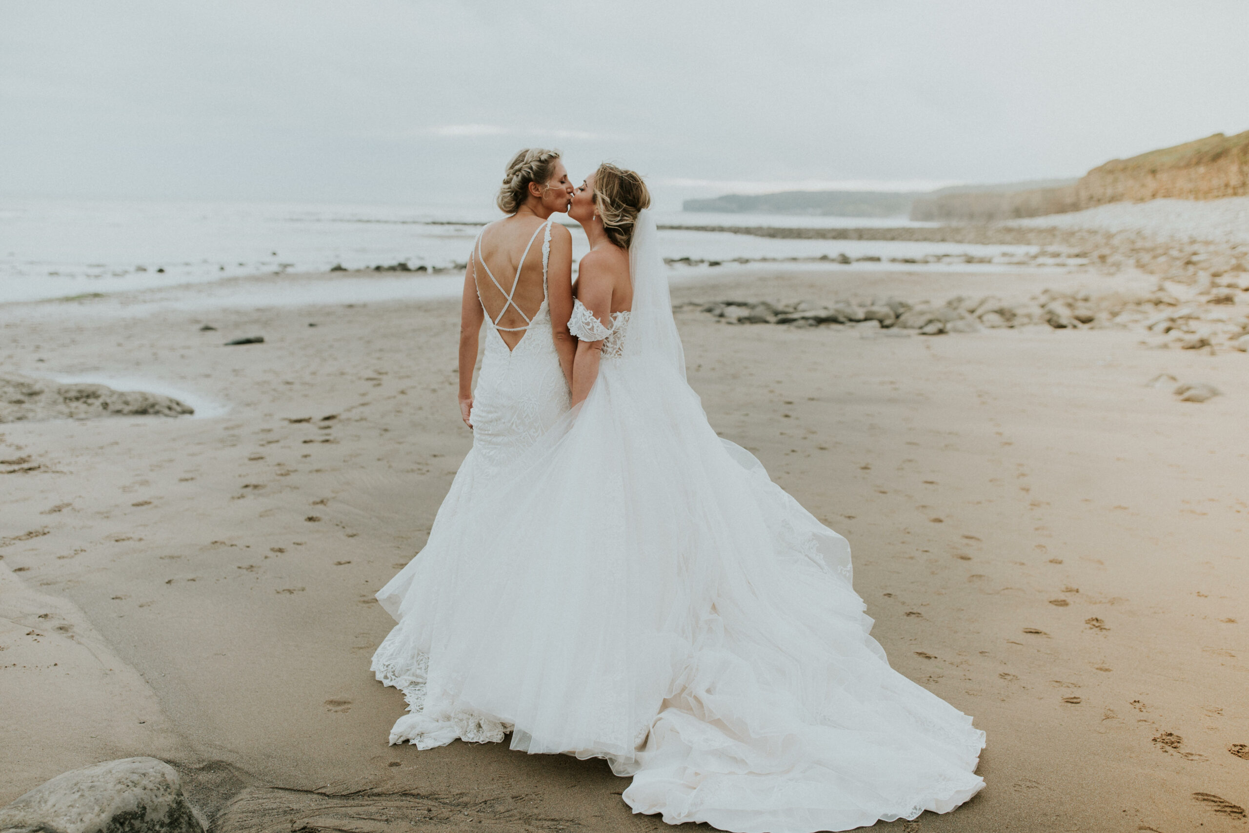 brides portraits down the beach 