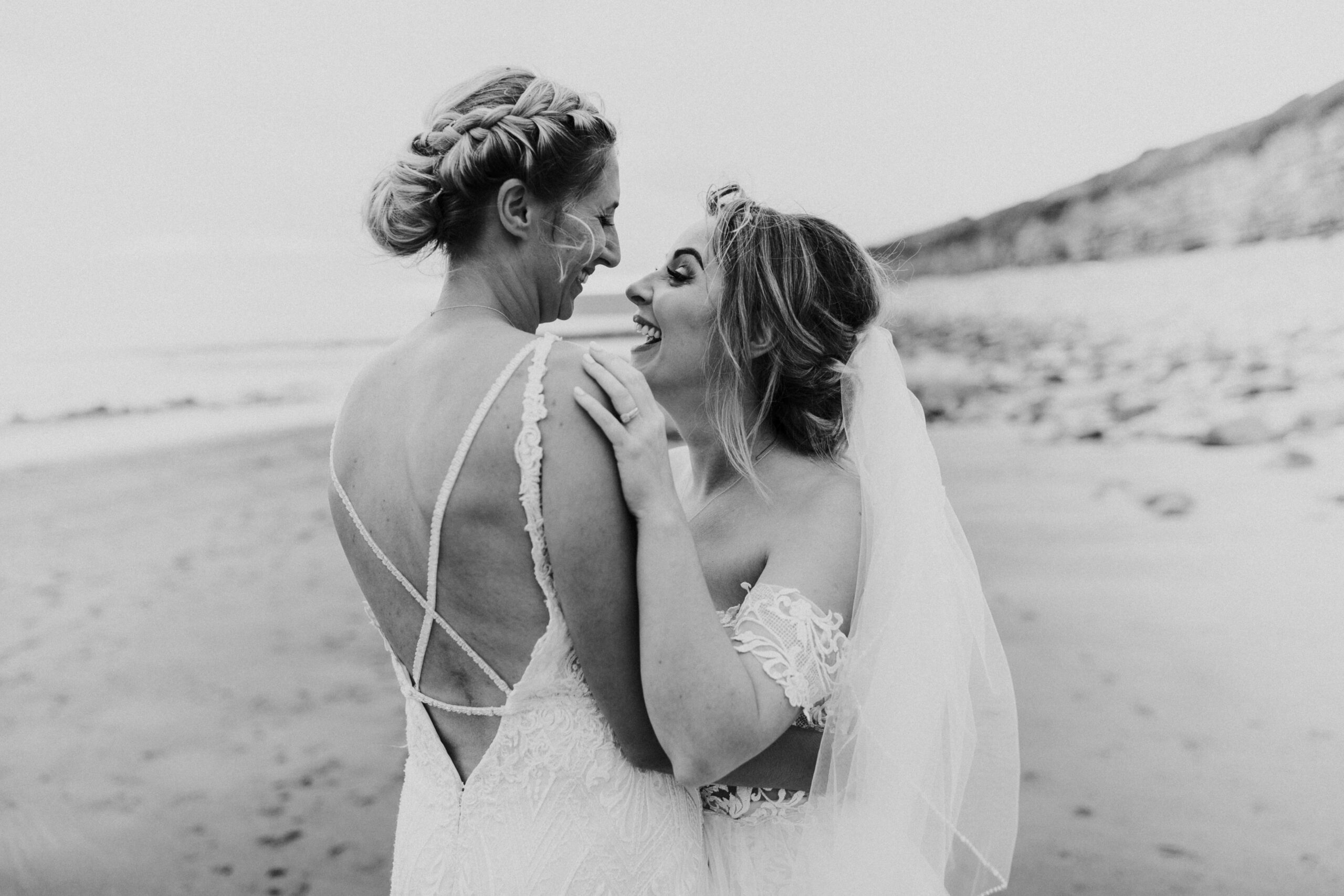 brides portraits down the beach 