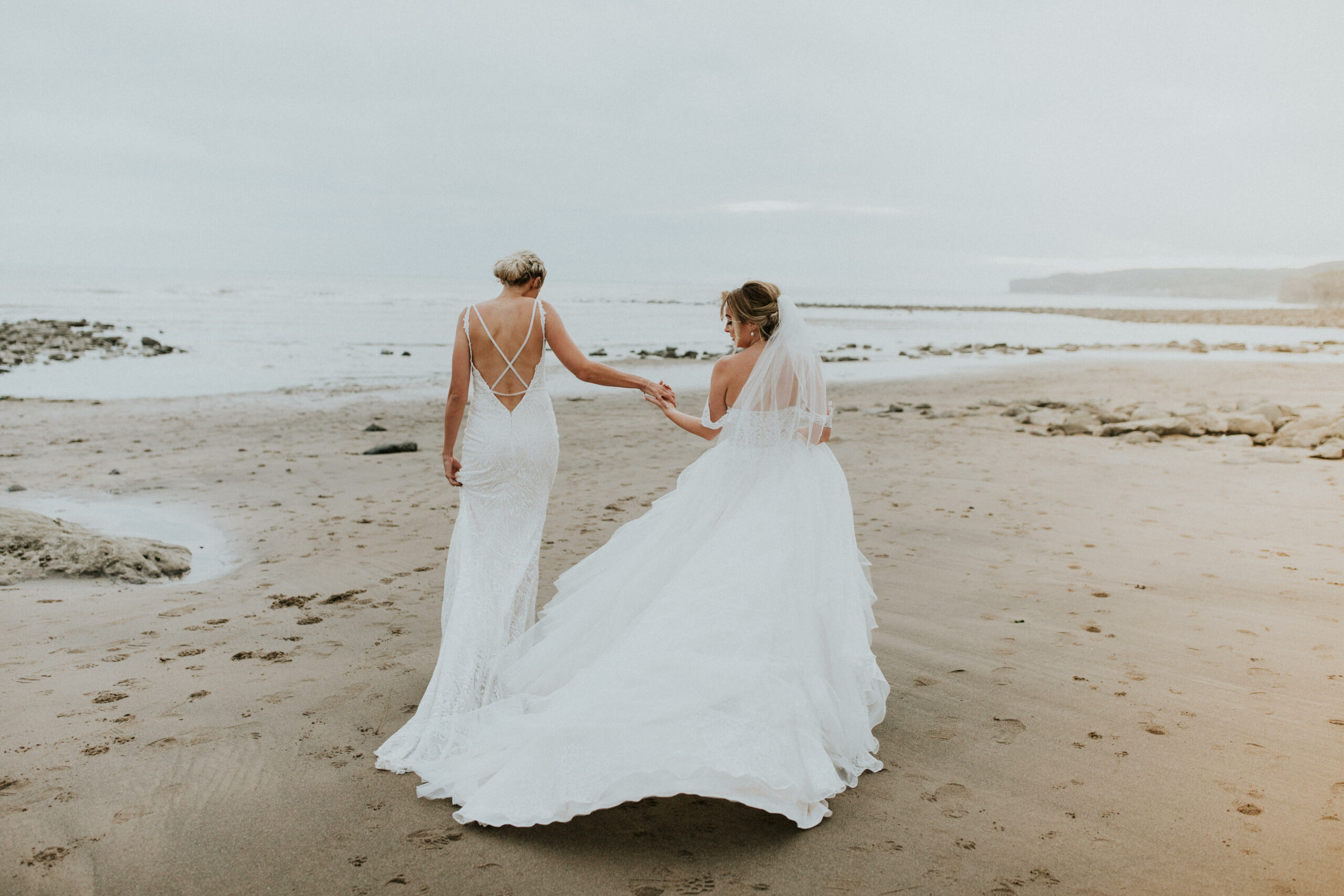 brides portraits down the beach 