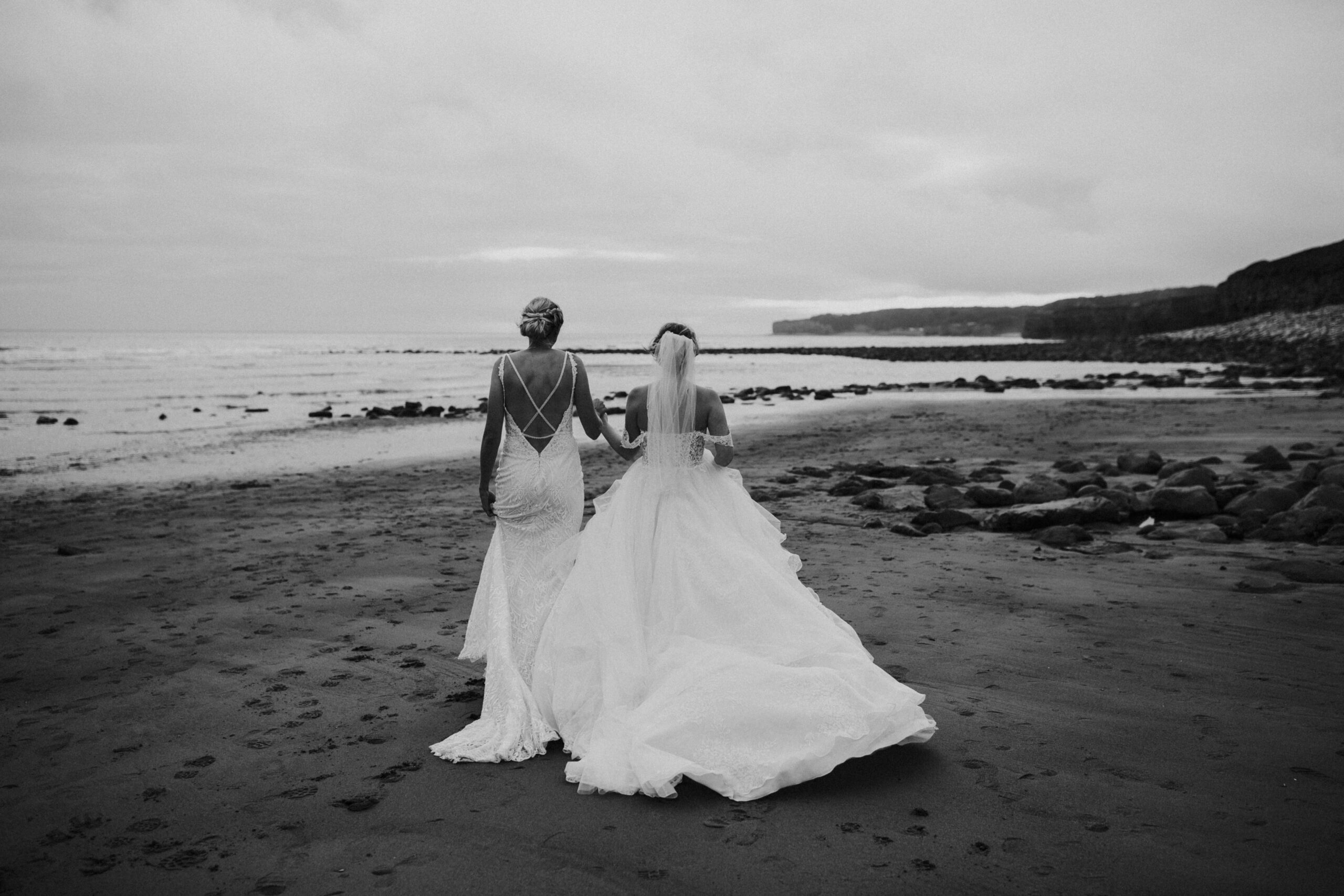 brides portraits down the beach 