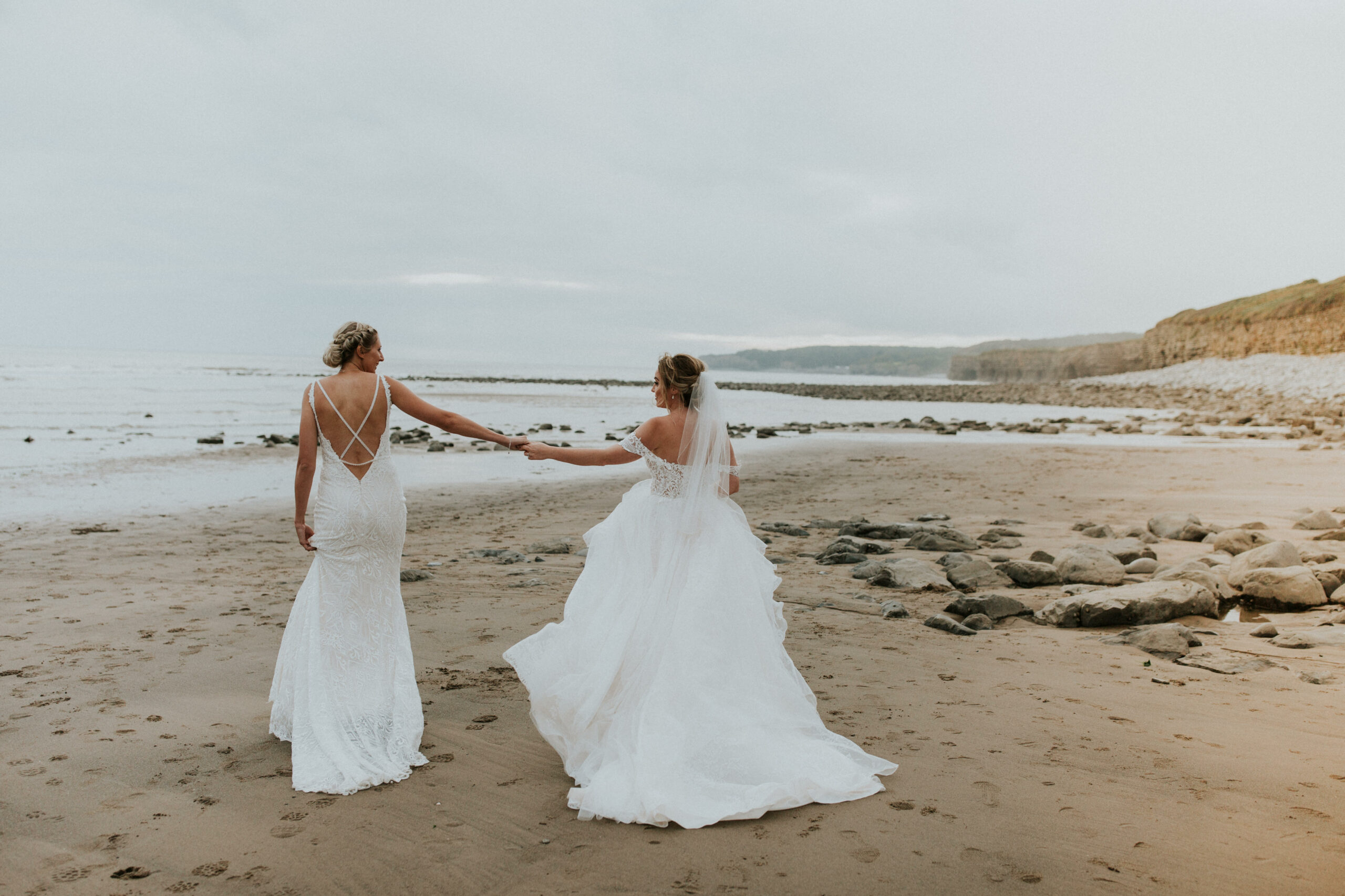 brides portraits down the beach 