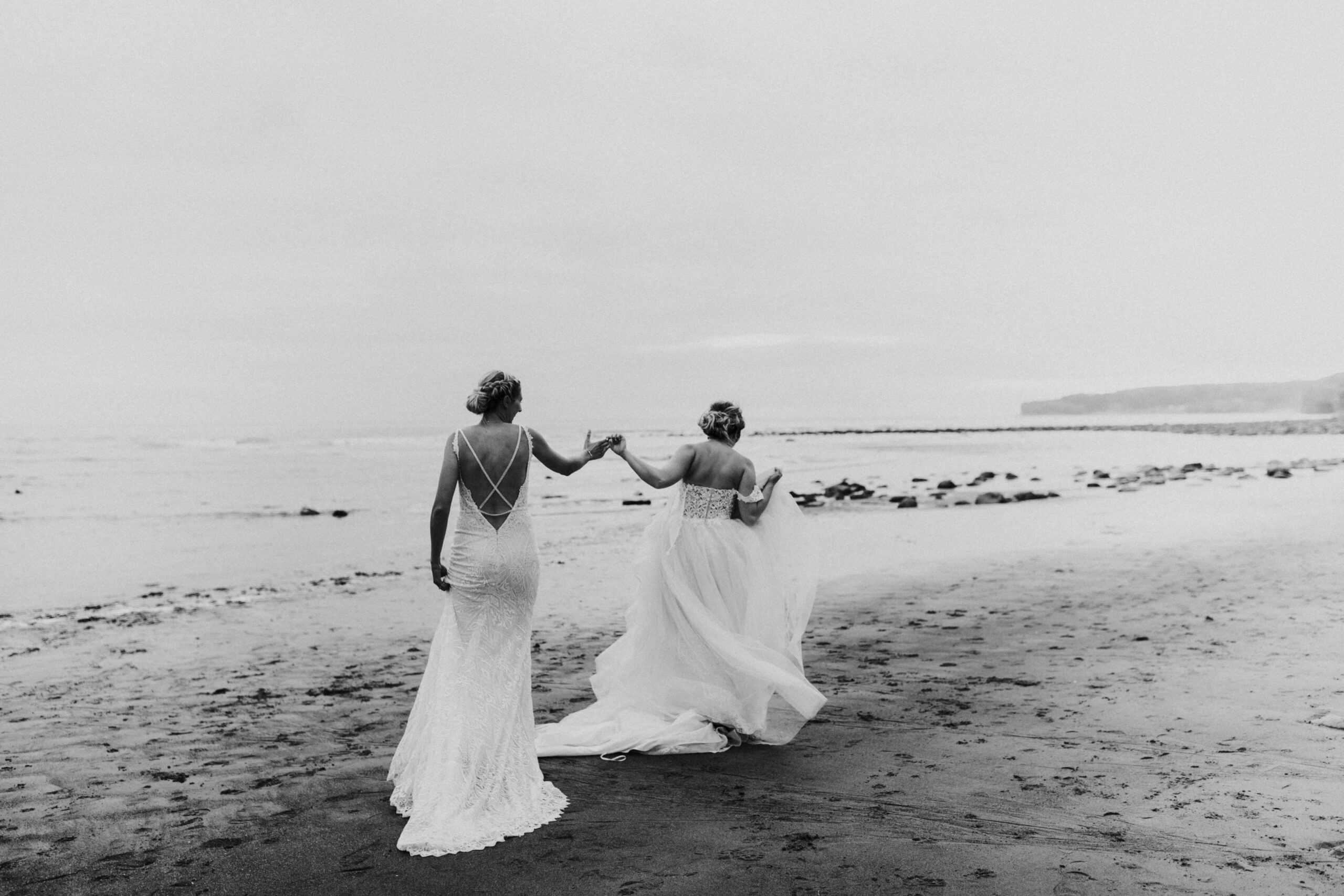 brides portraits down the beach 