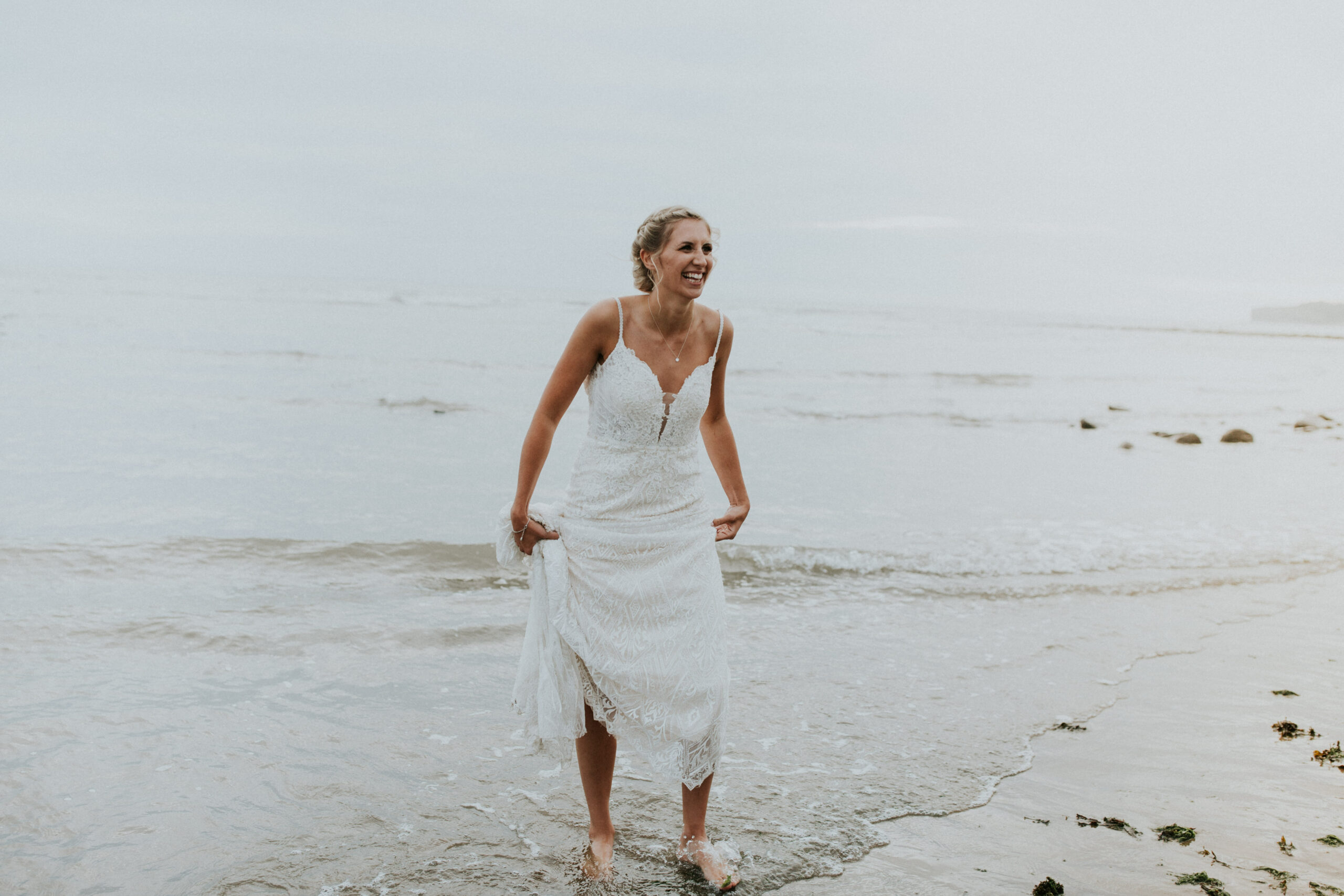 brides portraits down the beach 