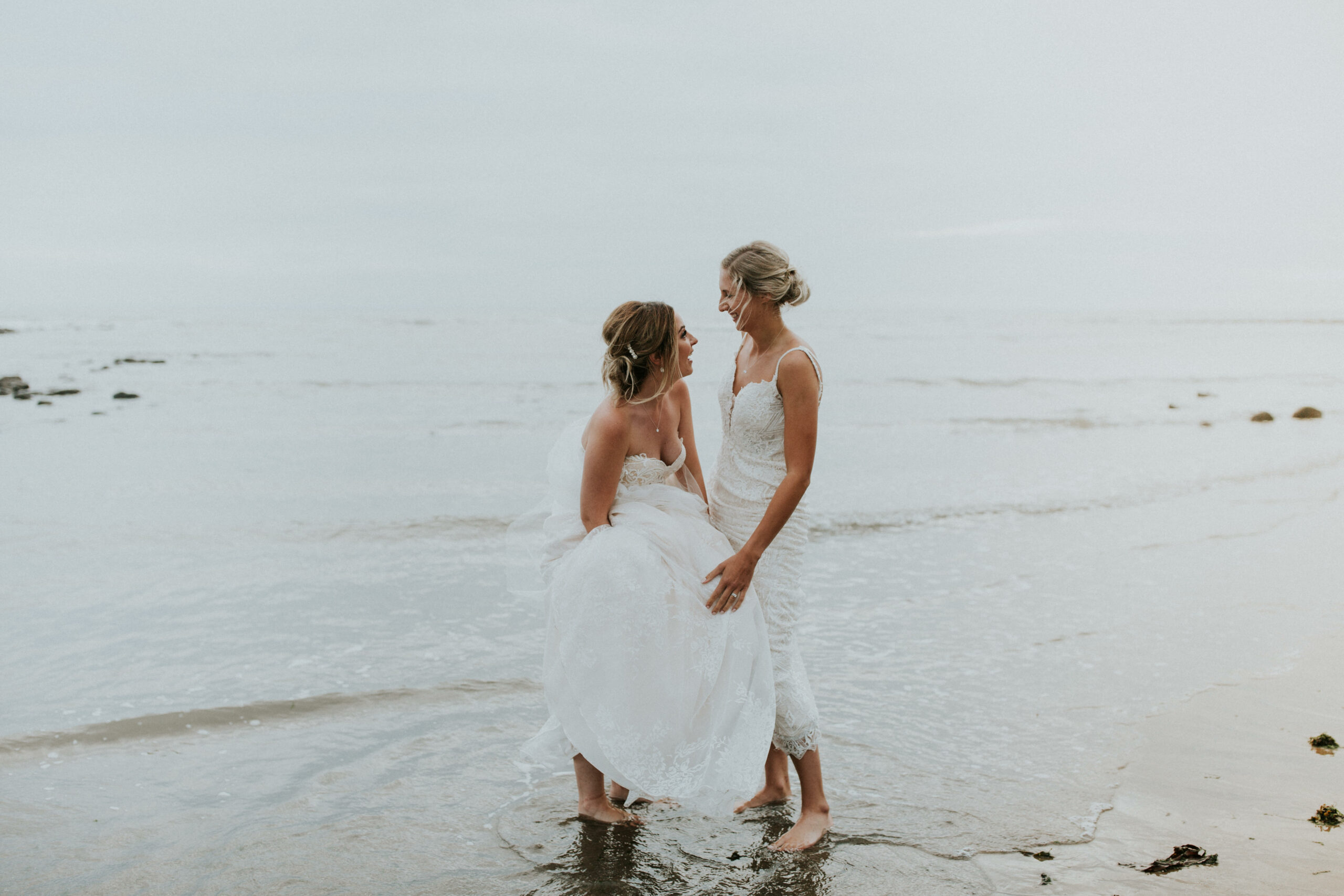 brides portraits down the beach 