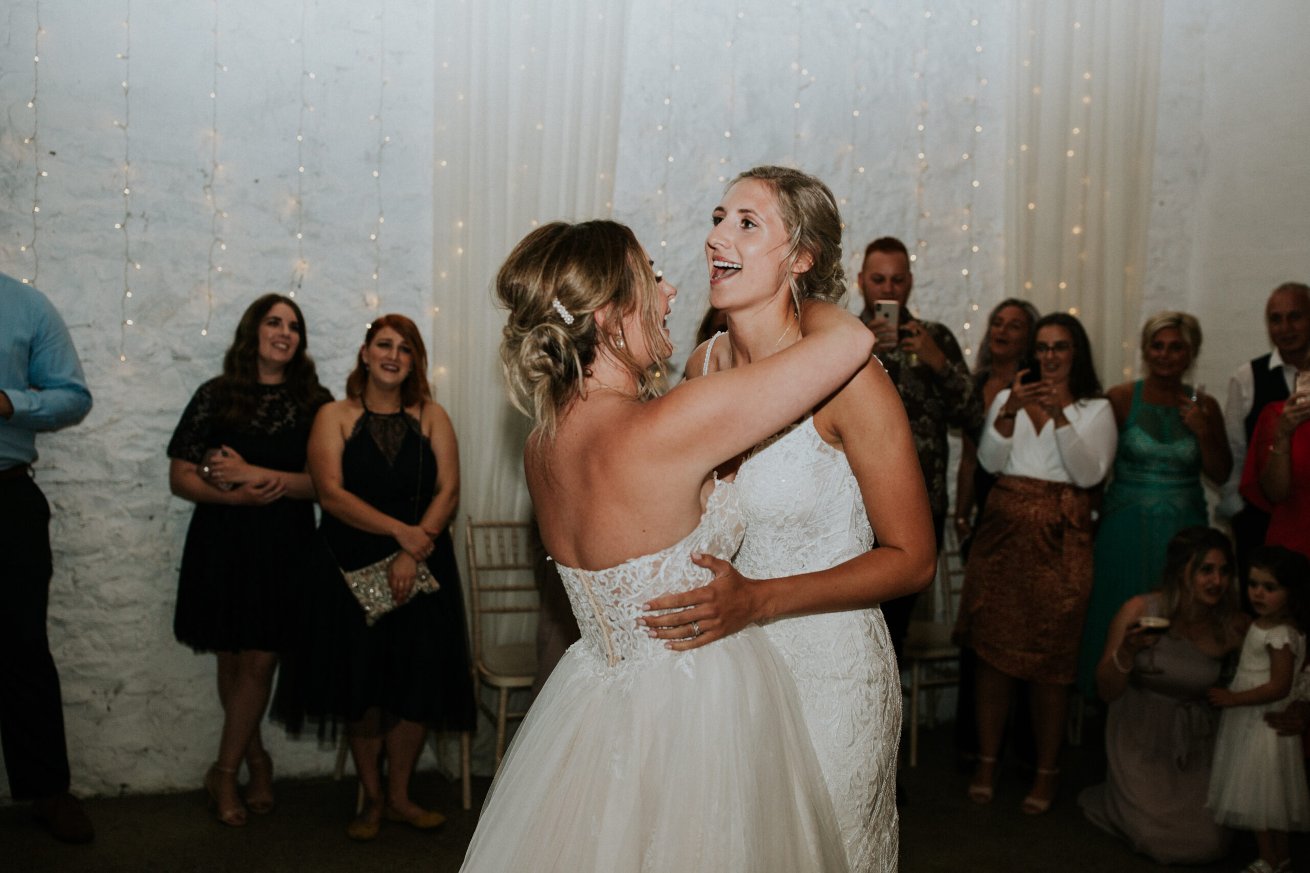 brides dancing their first dance 