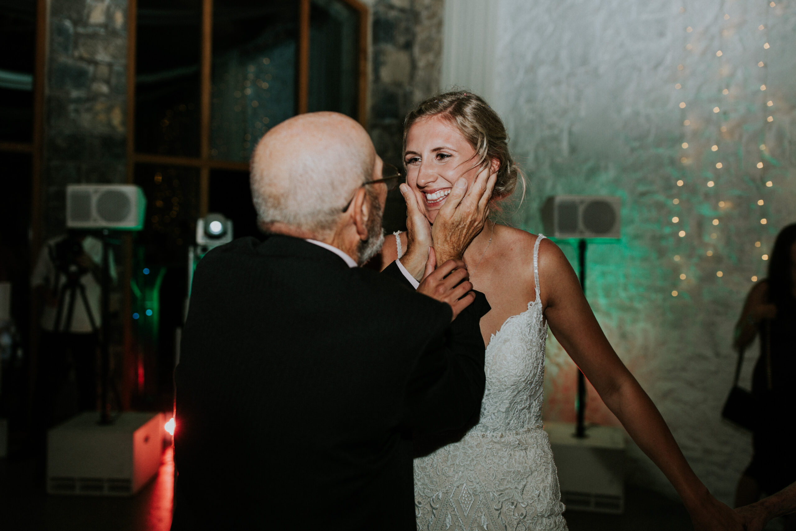 brides family member holding her face 