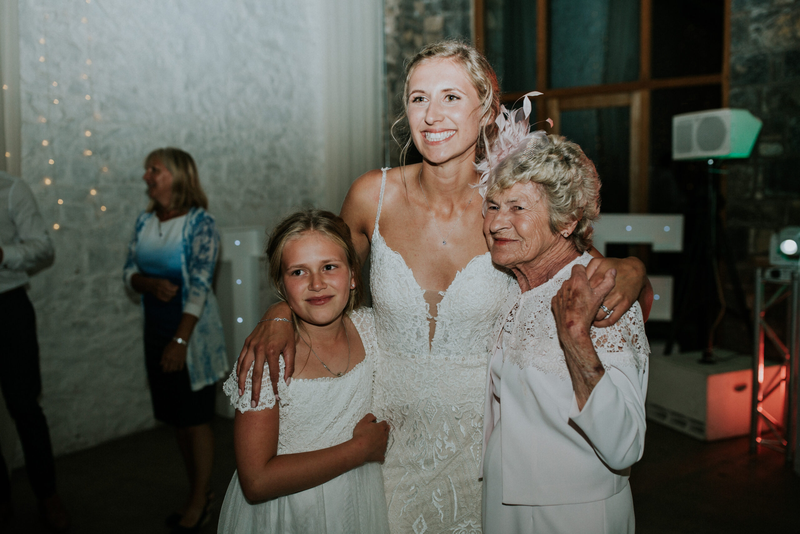 bride dancing with her niece and nan 