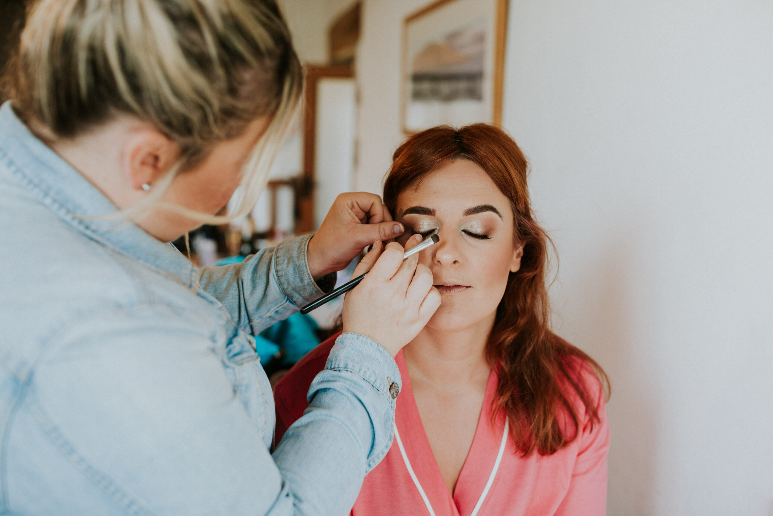 bridesmaid having her make-up done 