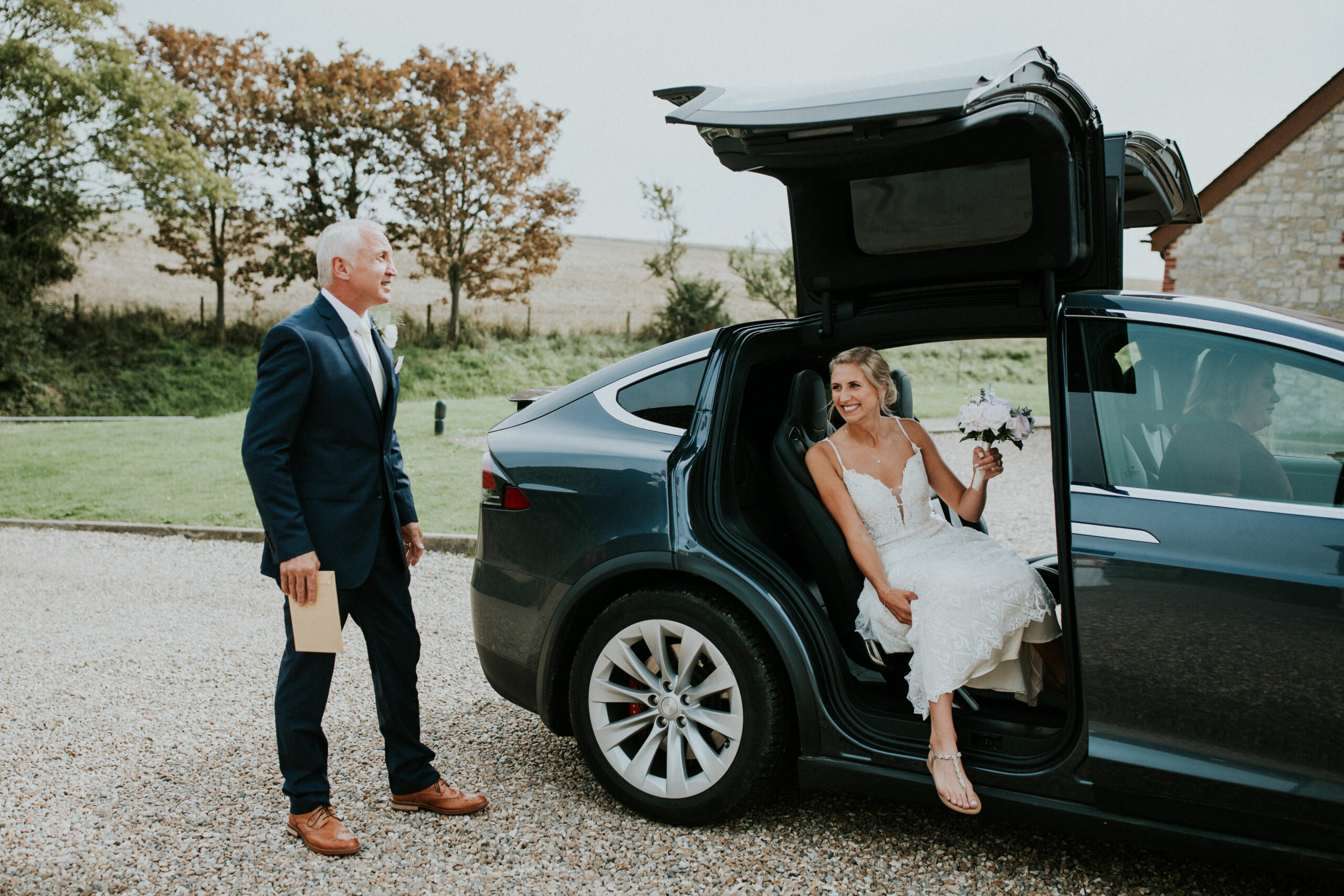 bride gets out of her car