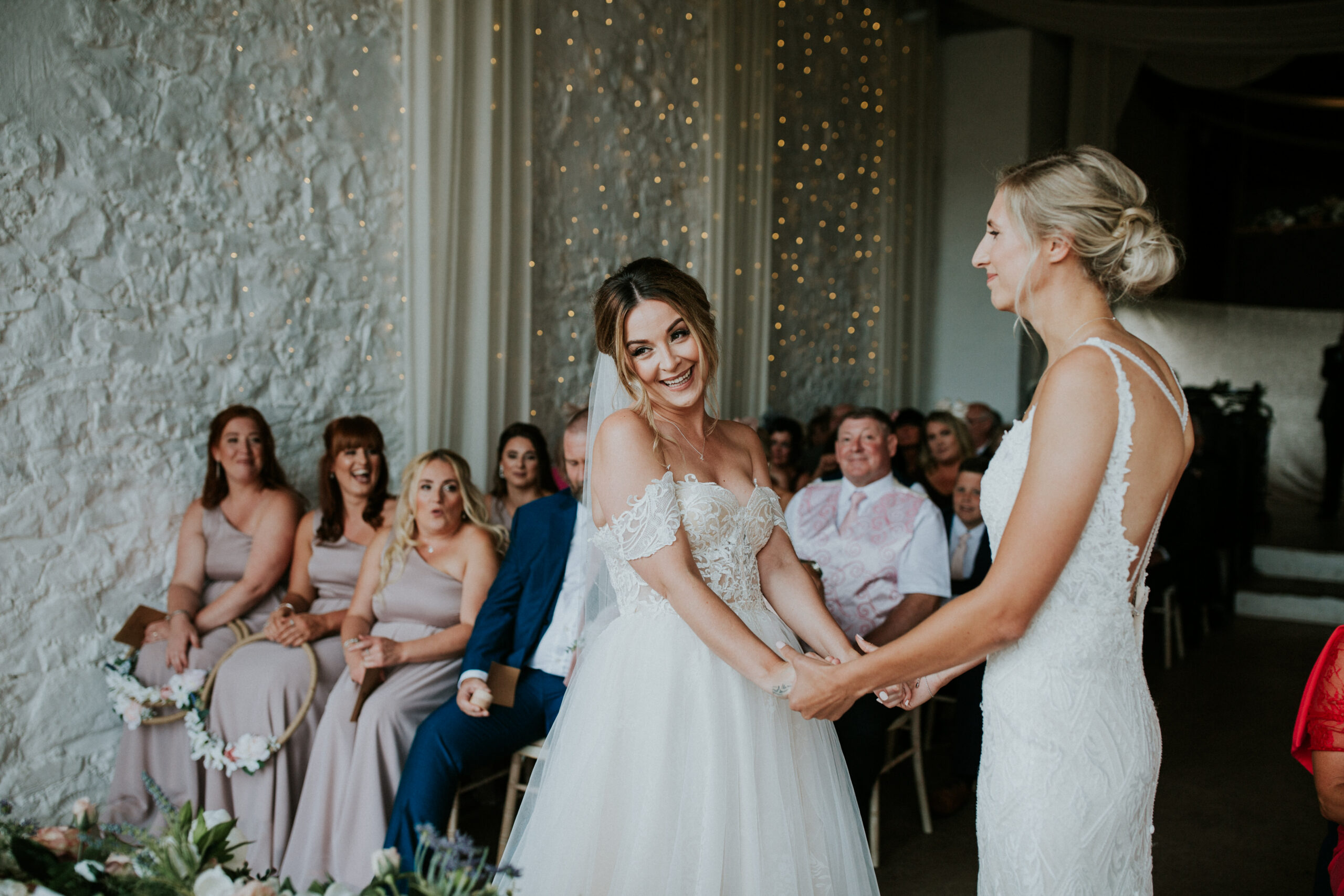 brides exchanging their vows 