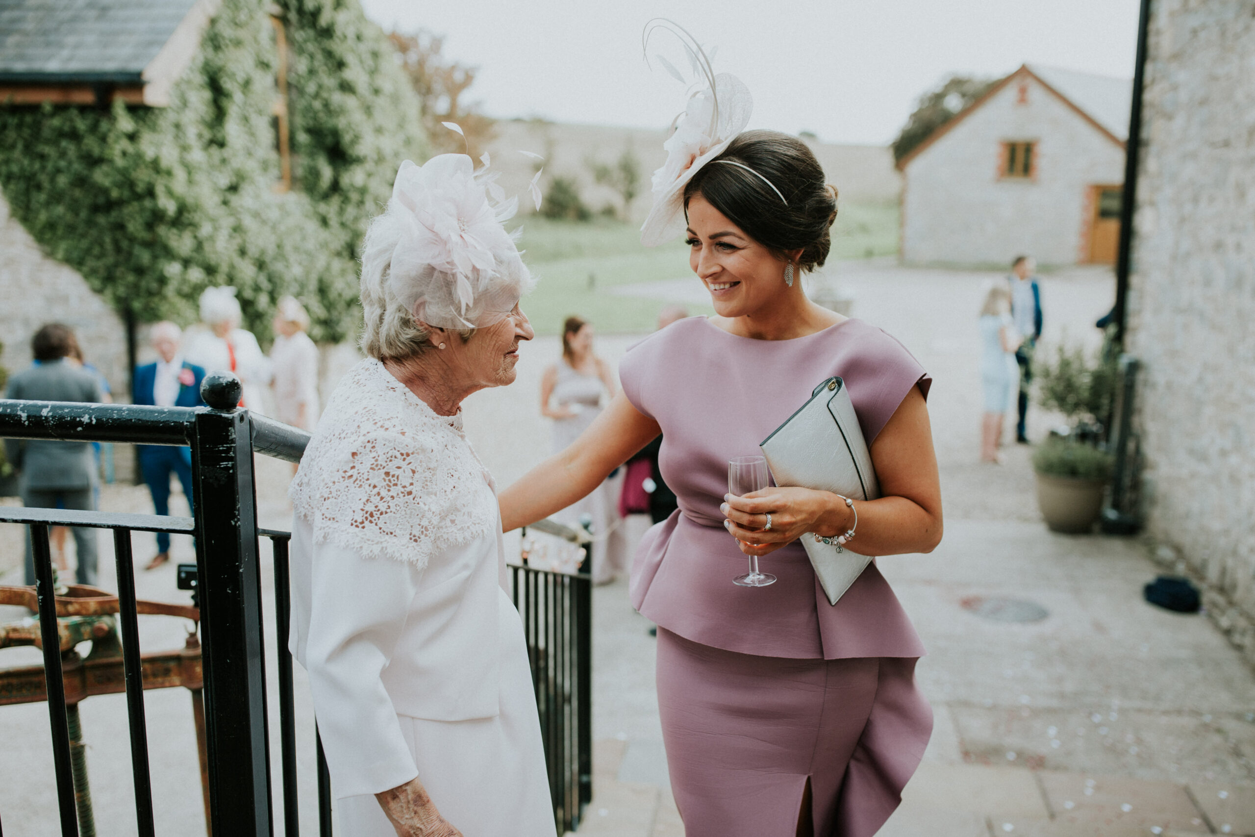 two guests smiling 